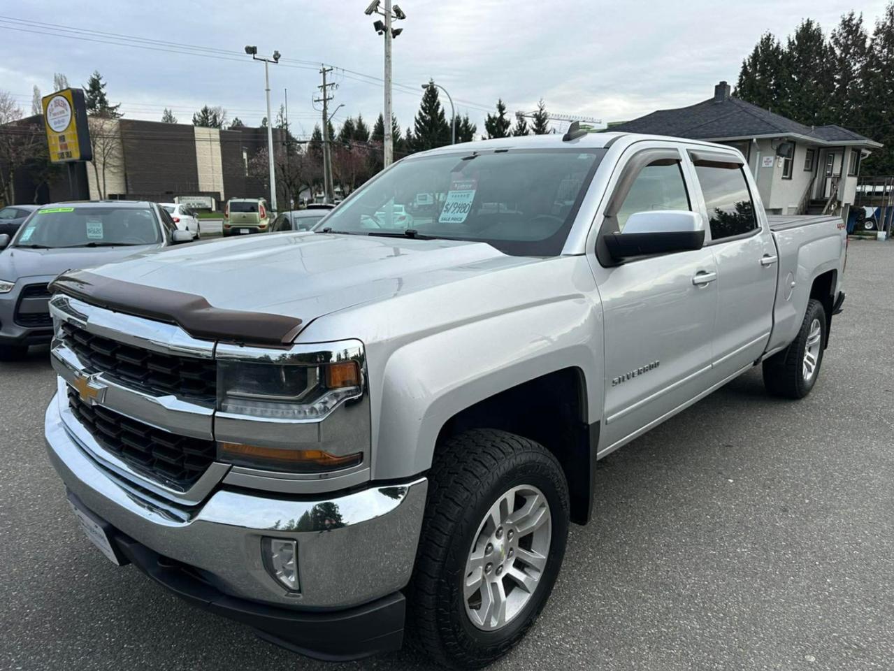 <p> <strong>2018 Chevrolet Silverado LT 4x4  Tough & Ready!</strong> </p><p> Reliable full-size truck with all the essentialsperfect for work or play!</p><p> <strong>Year:</strong> 2018<br> <strong>Mileage:</strong> 250,825 KM<br> <strong>Transmission:</strong> Automatic<br> <strong>Drivetrain:</strong> 4x4<br> <strong>Seating:</strong> 5 Passenger</p><p> <strong>Features:</strong><br> Heated Seats <br> Bluetooth Connectivity<br> Backup Camera <br> Power Windows, Locks, Mirrors & Seats<br> Cruise Control<br> Air Conditioning <br> Tilt Steering<br> Comfortable Cloth Interior<br> Tow Package <br> Factory Alloy Wheels</p><p> Strong & dependable<br> Great for towing and hauling<br> Ready for all seasons</p><p> <strong>Priced to sellgreat value truck!</strong></p><p> Message now to check it out or book a test drive!</p><span id=jodit-selection_marker_1774724167738_35812939238863617 data-jodit-selection_marker=start style=line-height: 0; display: none;></span> <p><br></p><p>Excellent, Affordable Lubrico Warranty Options Available on ALL Vehicles!</p><p><span style=background-color: rgba(var(--bs-white-rgb),var(--bs-bg-opacity)); color: var(--bs-body-color); font-family: open-sans, -apple-system, BlinkMacSystemFont, "Segoe UI", Roboto, Oxygen, Ubuntu, Cantarell, "Fira Sans", "Droid Sans", "Helvetica Neue", sans-serif; font-size: var(--bs-body-font-size); font-weight: var(--bs-body-font-weight); text-align: var(--bs-body-text-align);>All Vehicles are Safety Inspected by a 3rd Party Inspection Service.&nbsp;</span><br><br>We speak English, French, German, Punjabi, Hindi and Urdu Language!&nbsp;</p><p><br>We are proud to have sold over 15,000 vehicles to our customers throughout B.C. from this same&nbsp;location in Surrey.<span id=jodit-selection_marker_1747949601815_3502933354387793 data-jodit-selection_marker=start style=line-height: 0; display: none;></span></p><p><br>What Makes Us Different? <br>All of our vehicles have been sent to us from new car dealerships. They are all trade-ins and we are a large remarketing centre for the lower mainland new car dealerships. We do not purchase vehicles at auctions or from private sales. <br> <br>Administration Fee of $450<br> <br>Disclaimer: <br>Vehicle options are inputted from a VIN decoder. As we make our best effort to ensure all details are accurate we can not guarantee the information that is decoded from the VIN. Please verify any options before purchasing the vehicle. <br> <br>B.C. Dealers Trade-In Centre <br>14458 104th Ave. <br>Surrey, BC <br>V3R1L9 <br>DL# 26220</p><p> <br> </p><p>6-0-4-5-8-5-1-8-3-1</p>