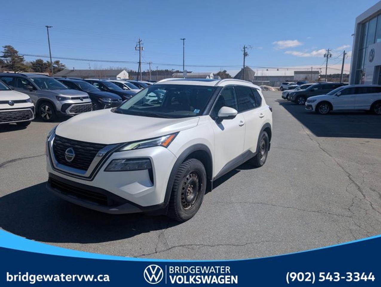 Recent Arrival! 2021 Nissan Rogue SVAWD | Apple CarPlay | Sirus XM Certified.This vehicle has passed Motor Vehicle Inspection (MVI) and is road-ready for its next owner. It is being sold without warranty and has not undergone a manufacturer or dealership certification program. Reconditioning & Inspection Includes: Provincial Motor Vehicle Inspection (MVI) Safety-related repairs completed as required to meet inspection standards Basic mechanical and safety checks Final road test Any MVI-related concerns must be reported within the applicable time frame. Any inspection-related concerns must be reviewed and addressed by the original selling dealer.CARFAX Canada No Reported AccidentsGlacier White AWD CVT with Xtronic 2.5L 4-Cylinder DOHC 16V AWD, 18 Aluminum Alloy Wheels, 4-Wheel Disc Brakes, 5.604 Axle Ratio, 6 Speakers, ABS brakes, Air Conditioning, Alloy wheels, AM/FM radio: SiriusXM, Auto High-beam Headlights, Automatic temperature control, Brake assist, Bumpers: body-colour, Cloth Seat Trim, Delay-off headlights, Driver door bin, Driver vanity mirror, Dual front impact airbags, Dual front side impact airbags, Electronic Stability Control, Four wheel independent suspension, Front anti-roll bar, Front Bucket Seats, Front dual zone A/C, Front reading lights, Full Tank of Fuel & Floor Mats, Fully automatic headlights, Heated door mirrors, Heated Front Bucket Seats, Heated front seats, Heated steering wheel, Illuminated entry, Knee airbag, Low tire pressure warning, NissanConnect featuring Apple CarPlay and Android Auto, Occupant sensing airbag, Outside temperature display, Overhead airbag, Overhead console, Panic alarm, Passenger door bin, Passenger vanity mirror, Power door mirrors, Power driver seat, Power moonroof, Power steering, Power windows, Radio data system, Radio: AM/FM Audio System w/6 Speakers, Rear anti-roll bar, Rear reading lights, Rear side impact airbag, Rear window defroster, Rear window wiper, Remote keyless entry, Roof rack: rails only, Speed control, Speed-Sensitive Wipers, Split folding rear seat, Spoiler, Steering wheel mounted audio controls, Tachometer, Telescoping steering wheel, Tilt steering wheel, Traction control, Trip computer, Turn signal indicator mirrors, Variably intermittent wipers.