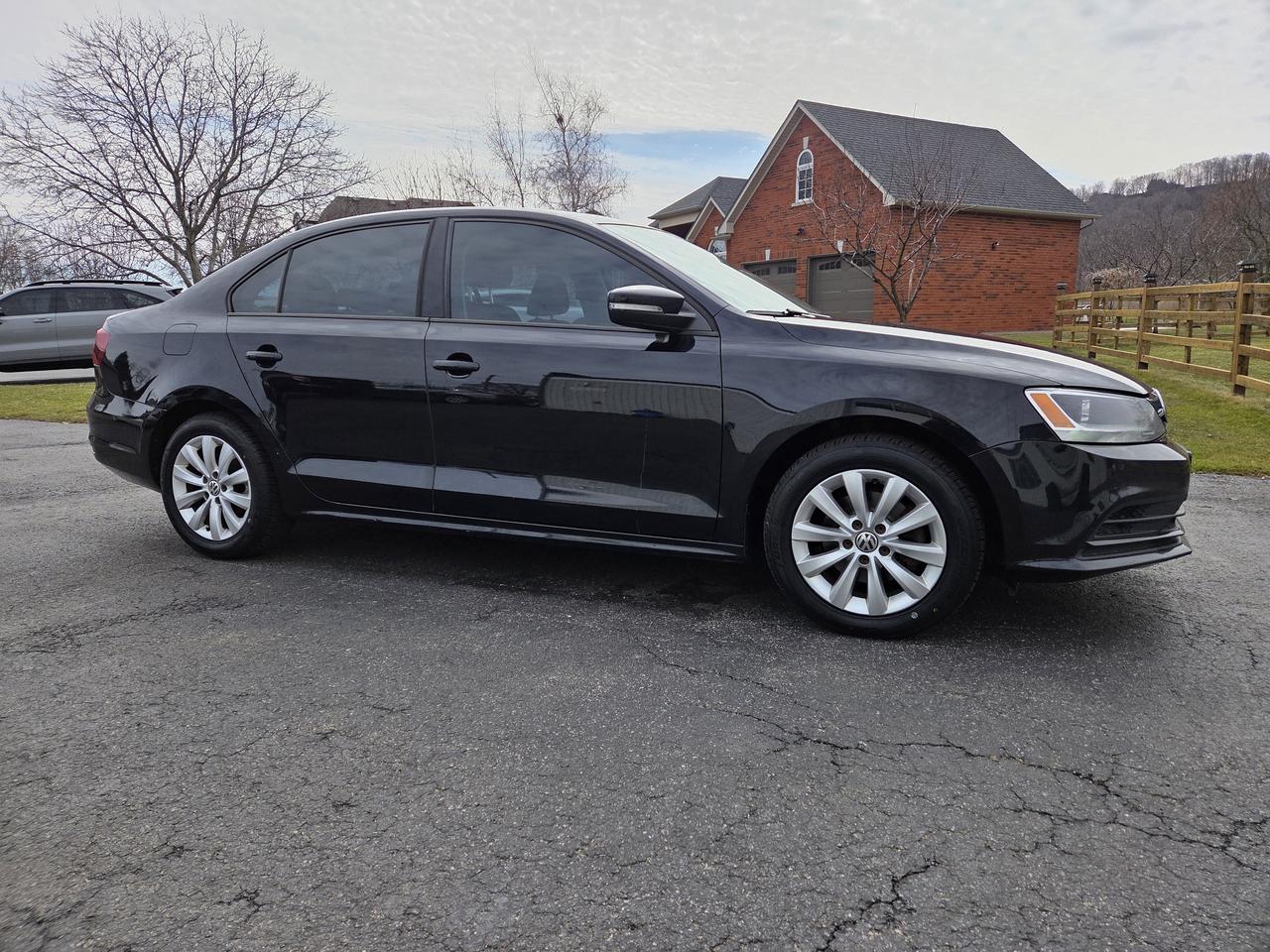 2016 Volkswagen Jetta Sedan 4dr 1.4 TSI Auto Trendline Photo