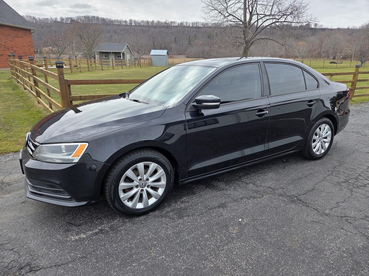 2016 Volkswagen Jetta Sedan 4dr 1.4 TSI Auto Trendline Photo