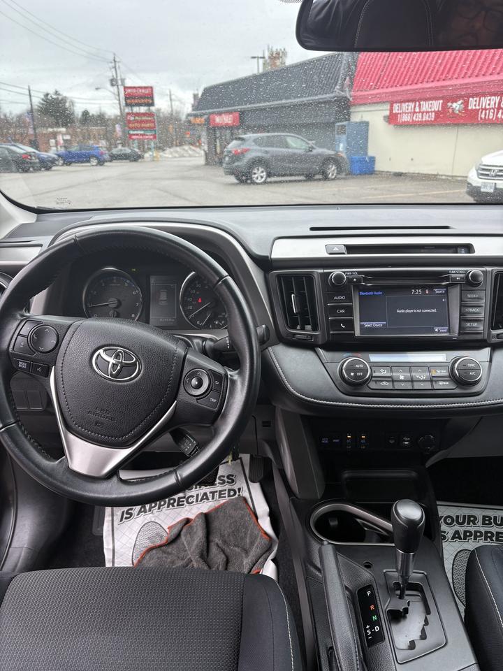 2016 Toyota RAV4 AWD 4dr XLE Photo