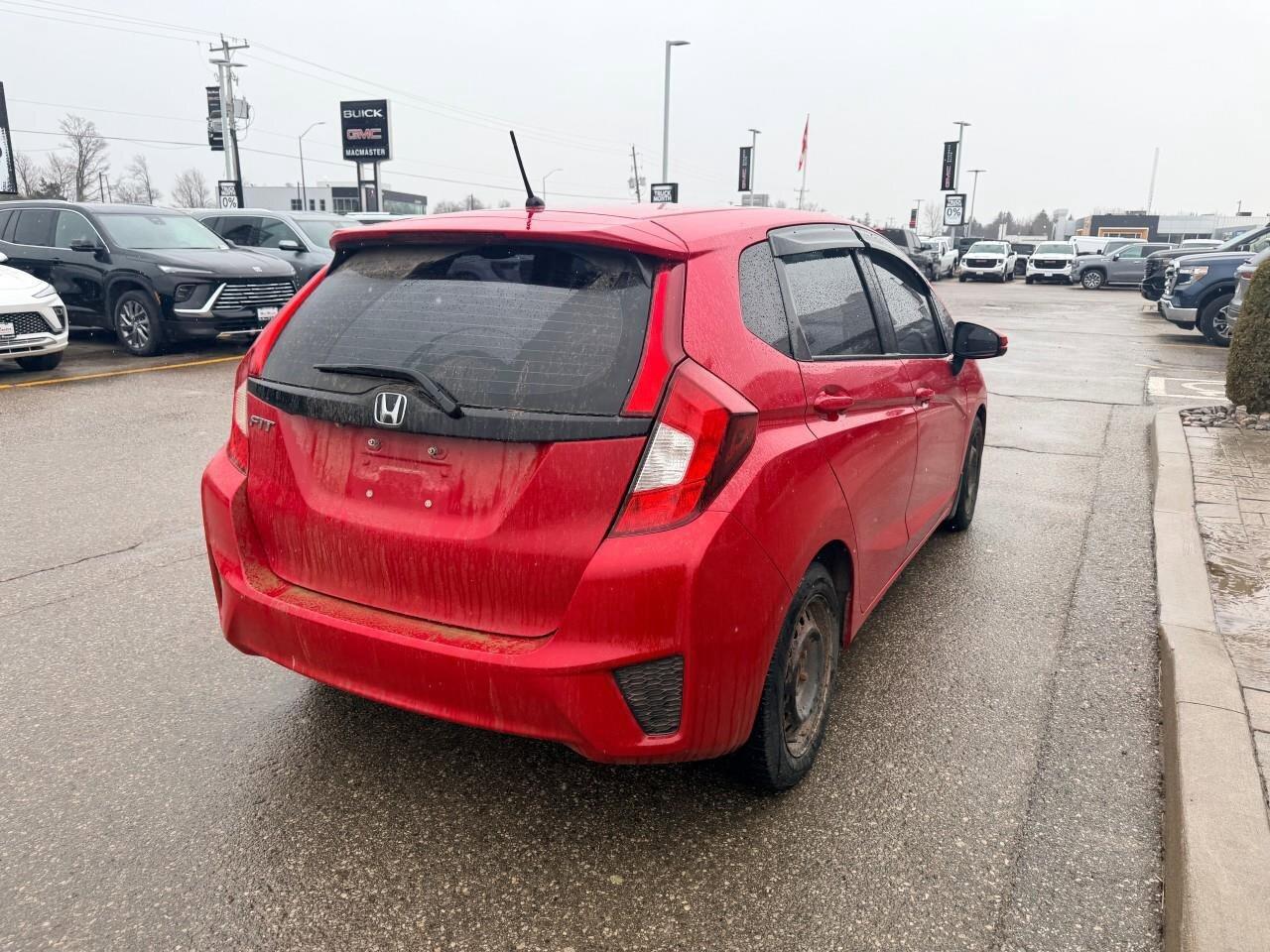 2016 Honda Fit LXLX, 1.5L 4-CYLINDER, HATCHBACK, FWD, CLOTH, SNOW Photo