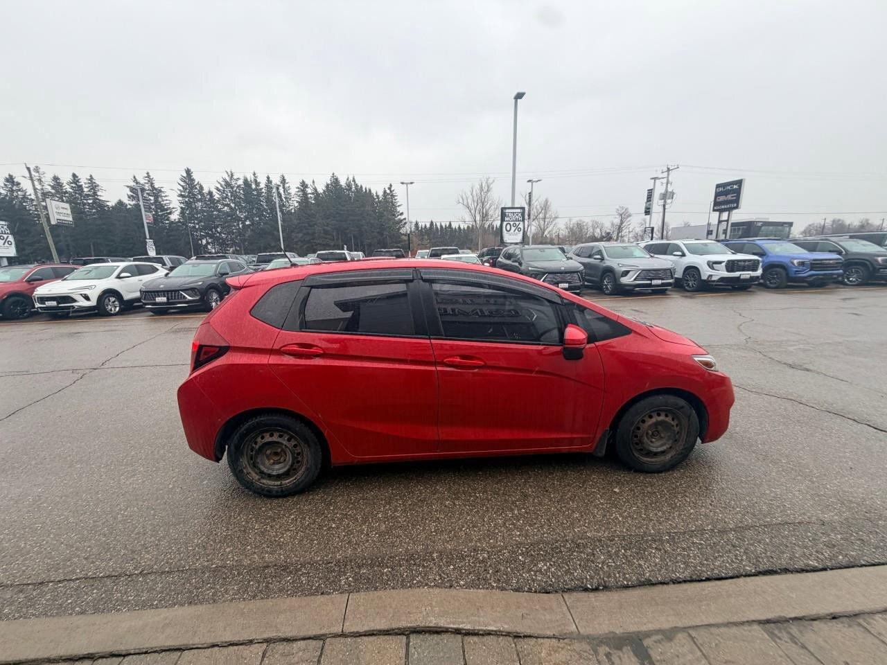 2016 Honda Fit LXLX, 1.5L 4-CYLINDER, HATCHBACK, FWD, CLOTH, SNOW Photo