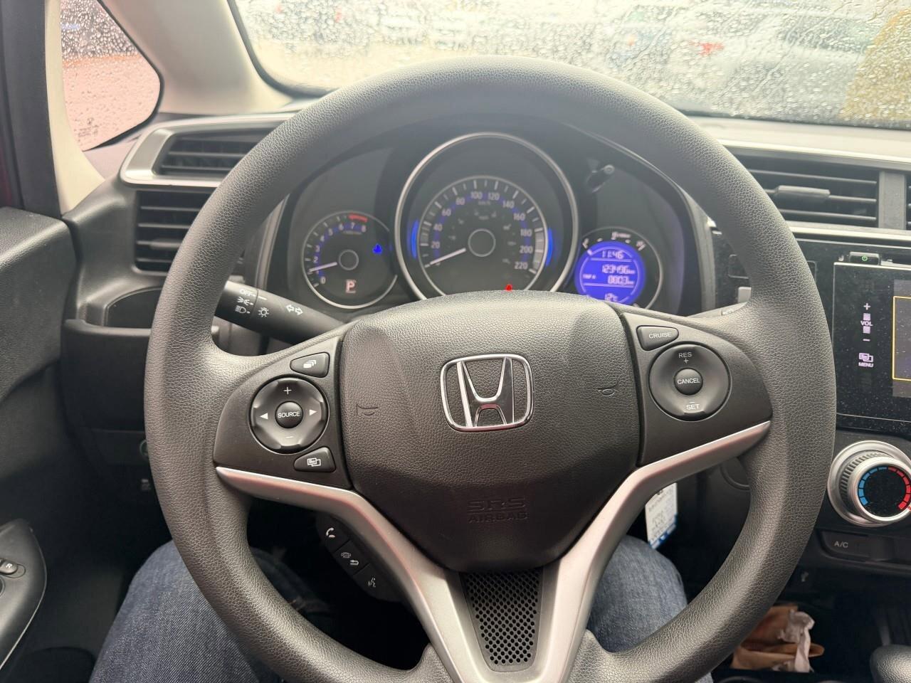 2016 Honda Fit LXLX, 1.5L 4-CYLINDER, HATCHBACK, FWD, CLOTH, SNOW Photo