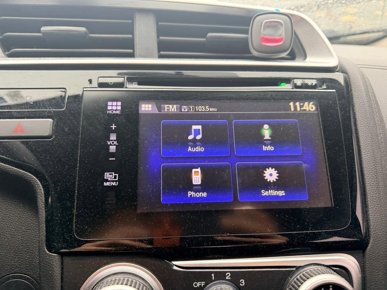 2016 Honda Fit LXLX, 1.5L 4-CYLINDER, HATCHBACK, FWD, CLOTH, SNOW Photo