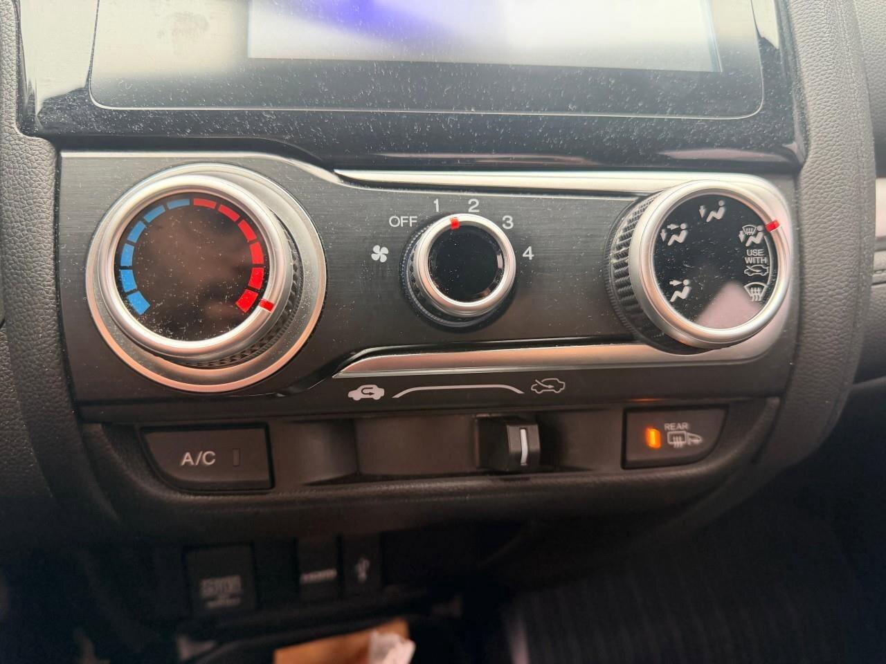 2016 Honda Fit LXLX, 1.5L 4-CYLINDER, HATCHBACK, FWD, CLOTH, SNOW Photo