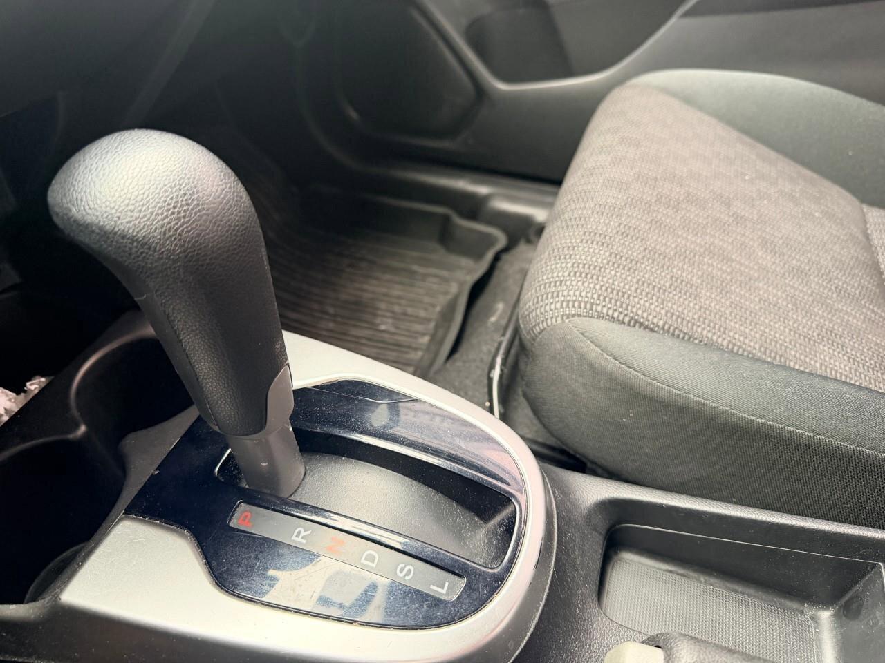 2016 Honda Fit LXLX, 1.5L 4-CYLINDER, HATCHBACK, FWD, CLOTH, SNOW Photo