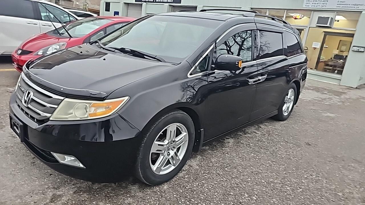 2012 Honda Odyssey 4dr Wgn Touring w/RES/DVD/Loaded/Navegation/Leathe Photo