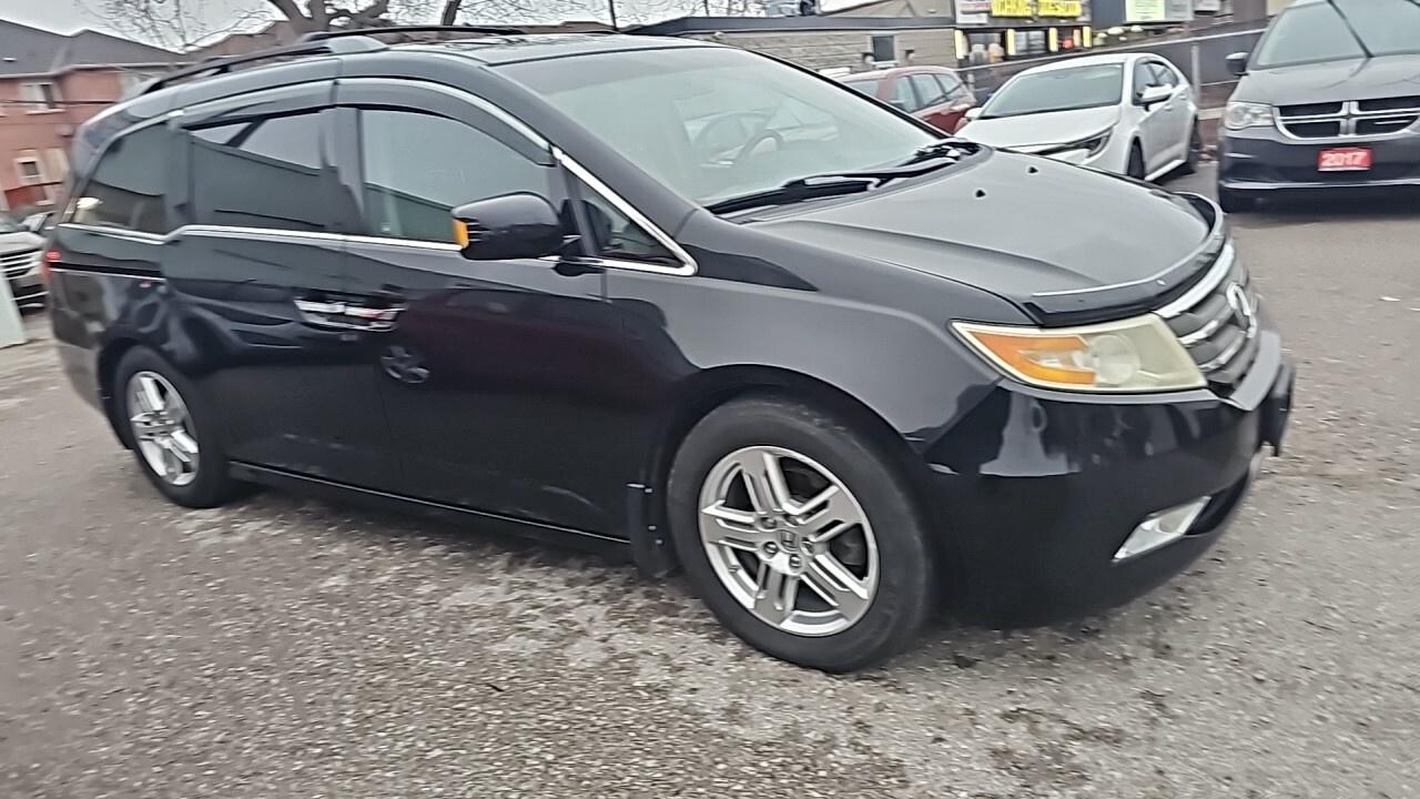 2012 Honda Odyssey 4dr Wgn Touring w/RES/DVD/Loaded/Navegation/Leathe Photo2