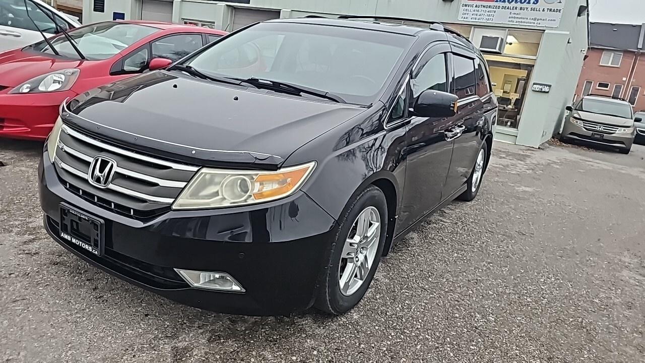 2012 Honda Odyssey 4dr Wgn Touring w/RES/DVD/Loaded/Navegation/Leathe Photo