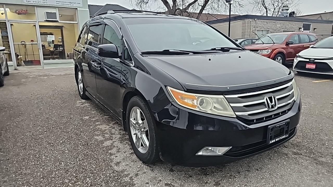 2012 Honda Odyssey 4dr Wgn Touring w/RES/DVD/Loaded/Navegation/Leathe Photo