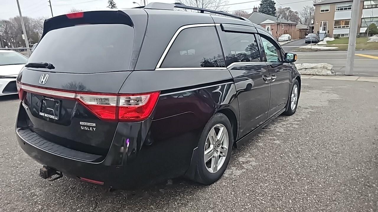 2012 Honda Odyssey 4dr Wgn Touring w/RES/DVD/Loaded/Navegation/Leathe Photo