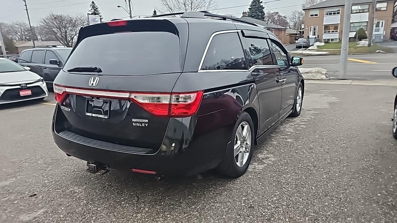 2012 Honda Odyssey 4dr Wgn Touring w/RES/DVD/Loaded/Navegation/Leathe Photo
