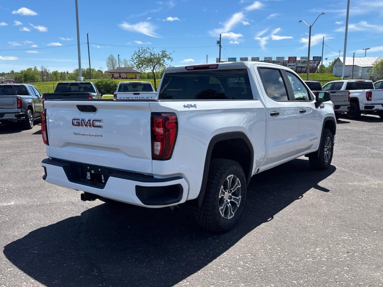 2026 GMC Sierra 1500 Pro New 6 Passenger 5.3L V8 Gas Engine 4X4 Crew Cab Truck with Factory Installed 2 Lift, Spray-On Bedliner, Power Drivers Seat and a 7 Touchscreen Radio with Wireless Apple CarPlay/Android Auto Photo