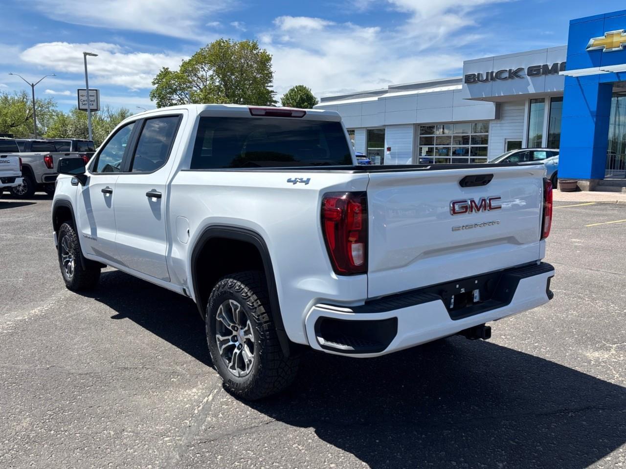2026 GMC Sierra 1500 Pro New 6 Passenger 5.3L V8 Gas Engine 4X4 Crew Cab Truck with Factory Installed 2 Lift, Spray-On Bedliner, Power Drivers Seat and a 7 Touchscreen Radio with Wireless Apple CarPlay/Android Auto Photo