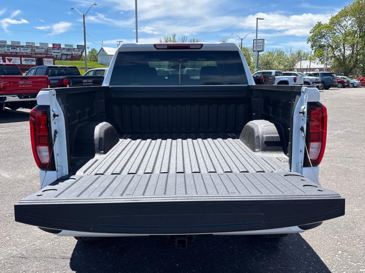 2026 GMC Sierra 1500 Pro New 6 Passenger 5.3L V8 Gas Engine 4X4 Crew Cab Truck with Factory Installed 2 Lift, Spray-On Bedliner, Power Drivers Seat and a 7 Touchscreen Radio with Wireless Apple CarPlay/Android Auto Photo
