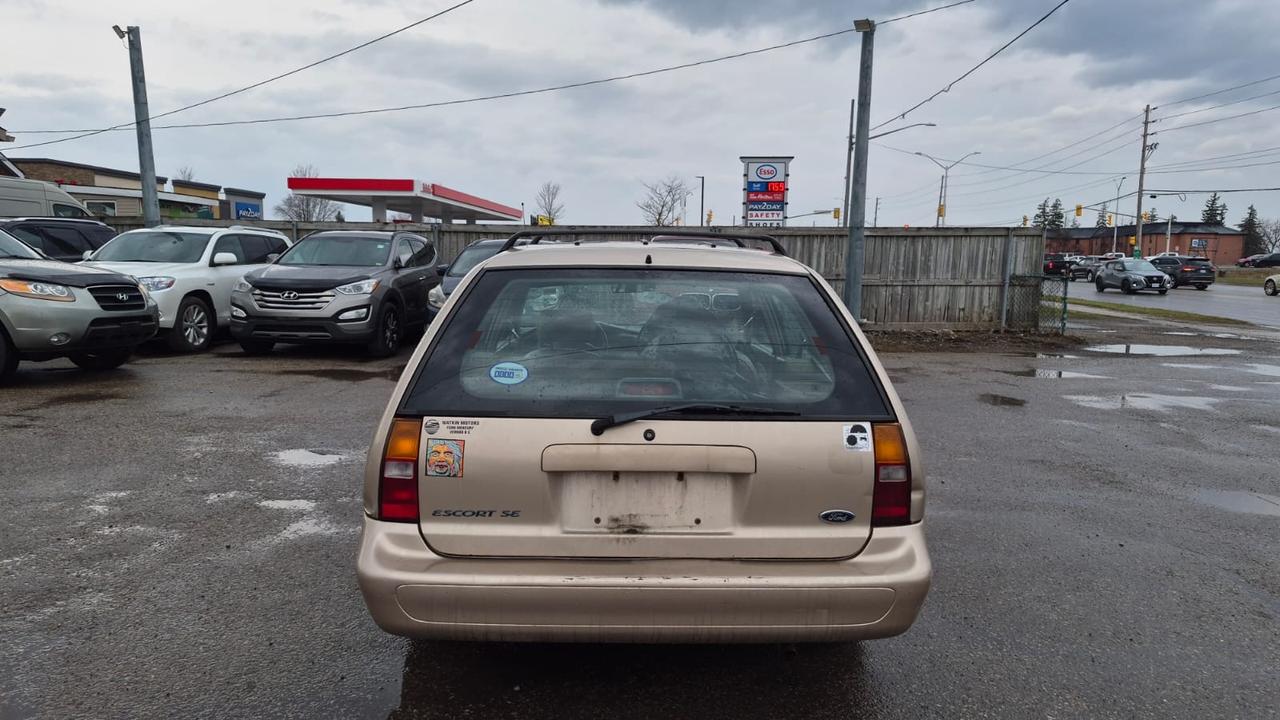 1998 Ford Escort SE, RUNS AND DRIVES WELL, AS IS Photo