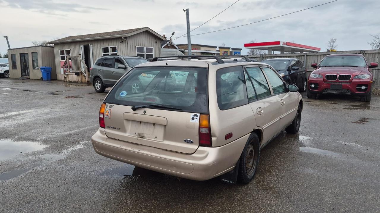 1998 Ford Escort SE, RUNS AND DRIVES WELL, AS IS Photo