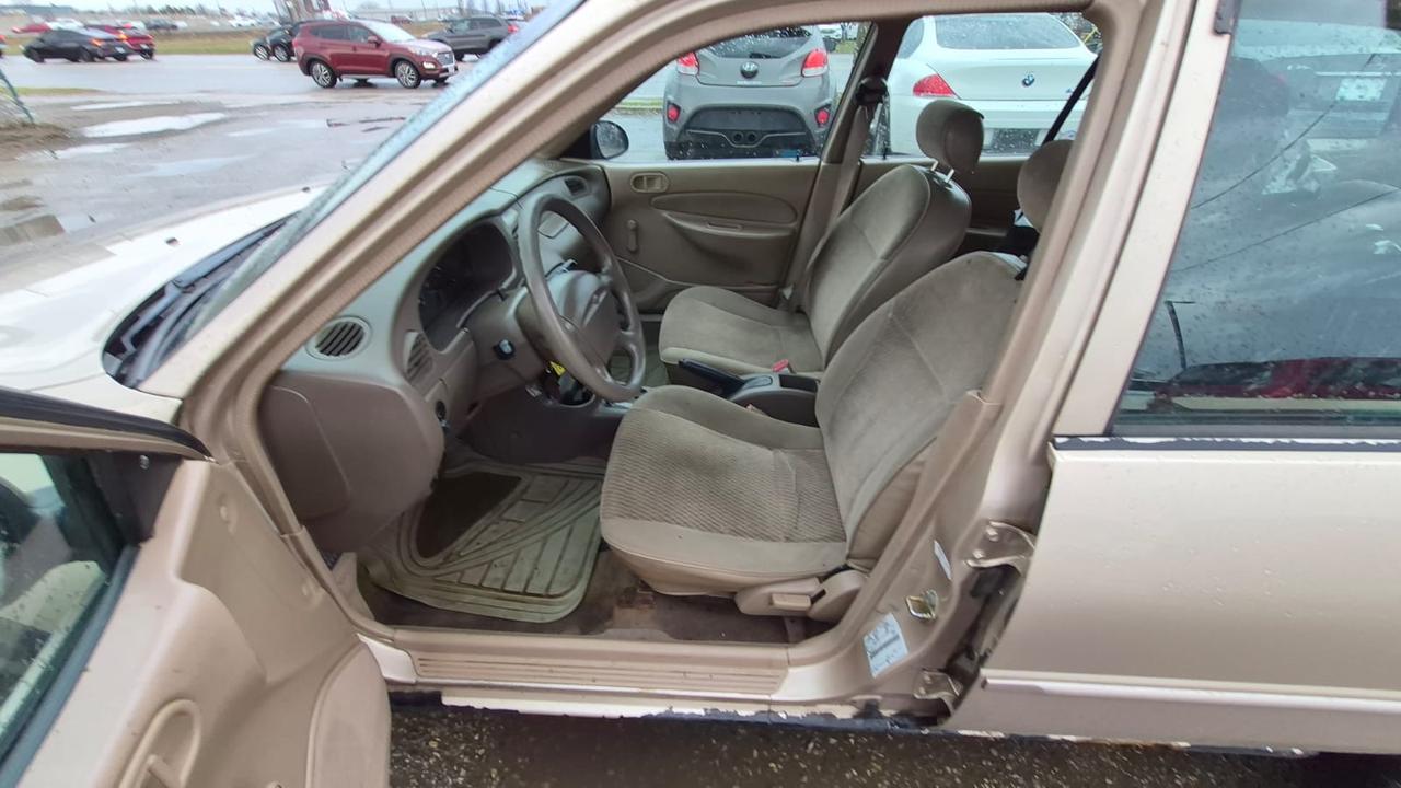 1998 Ford Escort SE, RUNS AND DRIVES WELL, AS IS Photo