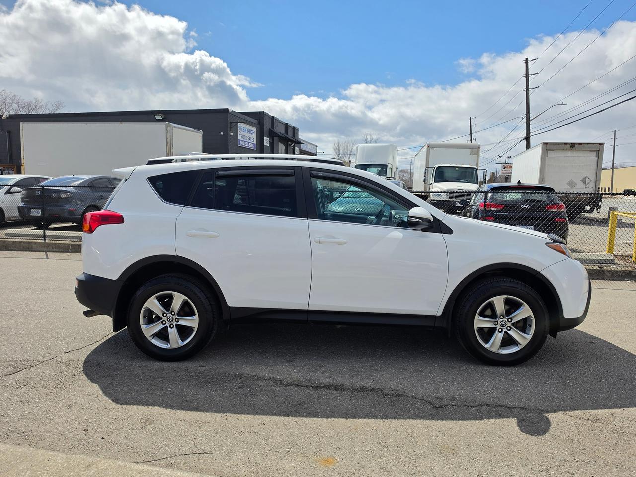 2015 Toyota RAV4 AWD 4dr XLE Photo