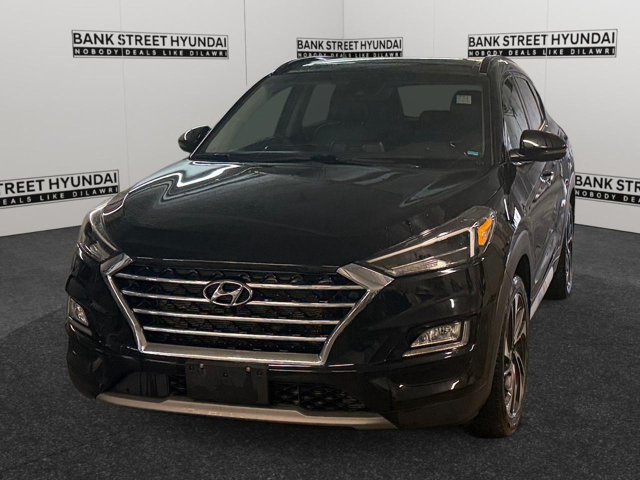 The 2019 Hyundai Tucson Ultimate AWD in striking Black is a versatile SUV that combines capability with elegance. With its all-wheel drive system and smooth automatic transmission, this Tucson offers responsive handling that makes city driving or countryside adventures a breeze. The exterior features bold and modern styling, enhanced by sleek alloy wheels and a sunroof/moonroof for that premium touch. Inside, the Tucson Ultimate is designed with luxury in mind, offering leather seats, a leather-wrapped steering wheel, and leatherette door trim. Passengers will appreciate the heated and ventilated front seats, along with the heated rear seats, ensuring comfort no matter the season. Technology is at the forefront in this Hyundai, including a state-of-the-art navigation system and smart device integration. Safety and convenience are top priorities with features such as a backup camera, lane assist, adaptive cruise control, and parking sensors. Stay connected on the go with Bluetooth connectivity and enjoy entertainment via satellite radio. This vehicle is perfect for families or individuals seeking a reliable and well-equipped SUV with advanced features. Contact us today to learn more and to test drive this exceptional 2019 Hyundai Tucson Ultimate AWD.