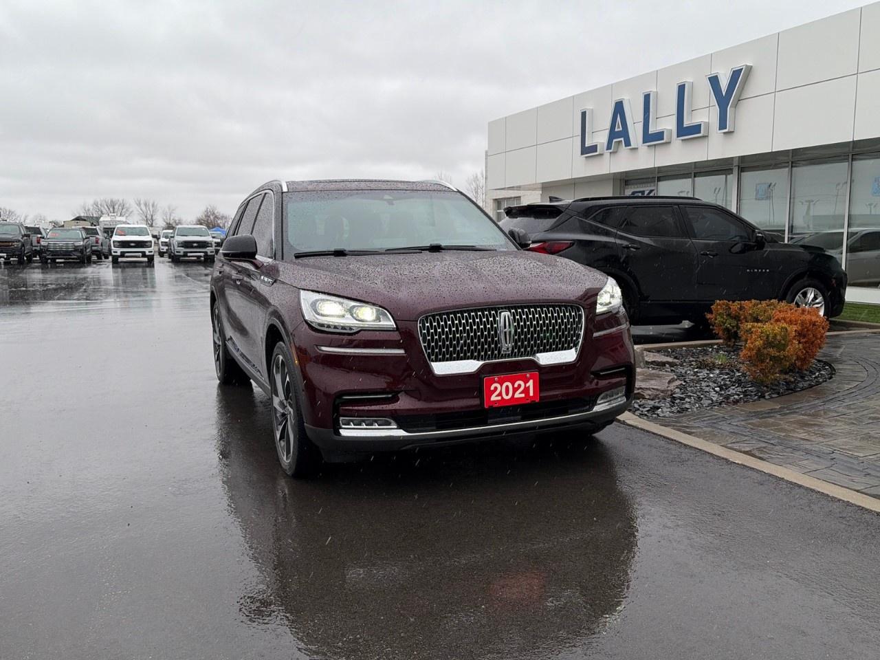 <p>The <strong>2021 Lincoln Aviator Reserve</strong> is a midsize luxury SUV powered by a twin-turbocharged 3.0-litre V6 engine paired with a smooth 10-speed automatic transmission, producing about 400 horsepower and 415 lb-ft of torque. It offers rear-wheel or all-wheel drive and delivers a refined, quiet ride with adaptive suspension and strong towing capability. Inside, the Reserve trim emphasizes comfort and technology, featuring premium leather seating, heated and ventilated seats, a panoramic sunroof, a large touchscreen infotainment system, and advanced driver-assistance features, making it a well-equipped, upscale family SUV.</p>