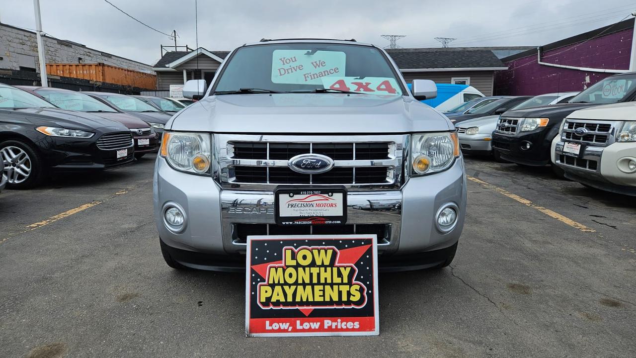 <p class=MsoNormal><span lang=EN-CA style=font-family: Segoe UI Emoji,sans-serif; mso-bidi-font-family: Segoe UI Emoji;>🚙</span><span lang=EN-CA> <strong>2010 FORD ESCAPE &ndash; ONLY 96,554 KM | CERTIFIED | CLEAN CARFAX | ACCIDENT FREE</strong>&nbsp;</span><span lang=EN-CA style=font-family: Segoe UI Emoji,sans-serif; mso-bidi-font-family: Segoe UI Emoji;>✅</span><span lang=EN-CA><br style=mso-special-character: line-break;><!-- [if !supportLineBreakNewLine]--><br style=mso-special-character: line-break;><!--[endif]--></span></p><p class=MsoNormal><span lang=EN-CA style=font-family: Segoe UI Emoji,sans-serif; mso-bidi-font-family: Segoe UI Emoji;>🔥</span><span lang=EN-CA> <strong>ULTRA LOW MILEAGE &ndash; ONLY 96,554 KM</strong> </span><span lang=EN-CA style=font-family: Segoe UI Emoji,sans-serif; mso-bidi-font-family: Segoe UI Emoji;>🔥</span></p><p class=MsoNormal><span lang=EN-CA style=font-family: Segoe UI Emoji,sans-serif; mso-bidi-font-family: Segoe UI Emoji;>💰</span><span lang=EN-CA> <strong>Price:</strong> $10,495 + HST & Licensing<br></span><span lang=EN-CA style=font-family: Segoe UI Emoji,sans-serif; mso-bidi-font-family: Segoe UI Emoji;>📍</span><span lang=EN-CA> <strong>Dealer:</strong> Precision Motors &ndash; 643 Parkdale Ave N, Hamilton, ON<br></span><span lang=EN-CA style=font-family: Segoe UI Emoji,sans-serif; mso-bidi-font-family: Segoe UI Emoji;>📞</span><span lang=EN-CA> <strong>Call/Text:</strong> 416-270-7657</span></p><p class=MsoNormal><span lang=EN-CA style=font-family: Segoe UI Emoji,sans-serif; mso-bidi-font-family: Segoe UI Emoji;>📝</span><span lang=EN-CA> <strong>Safety Certified | Accident-Free | Fully Inspected | Ready to Drive</strong></span></p><div class=MsoNormal style=text-align: center; align=center><hr align=center size=2 width=100%></div><p class=MsoNormal><strong><span lang=EN-CA style=font-family: Segoe UI Emoji,sans-serif; mso-bidi-font-family: Segoe UI Emoji;>🔍</span><span lang=EN-CA> Vehicle Details</span></strong></p><p class=MsoNormal><span lang=EN-CA style=font-family: Segoe UI Emoji,sans-serif; mso-bidi-font-family: Segoe UI Emoji;>✅</span><span lang=EN-CA> <strong>VIN:</strong> 1FMCU9EG1AKA28032</span></p><p class=MsoNormal><span lang=EN-CA style=font-family: Segoe UI Emoji,sans-serif; mso-bidi-font-family: Segoe UI Emoji;>✅</span><span lang=EN-CA> <strong>Year:</strong> 2010<br></span><span lang=EN-CA style=font-family: Segoe UI Emoji,sans-serif; mso-bidi-font-family: Segoe UI Emoji;>✅</span><span lang=EN-CA> <strong>Make / Model:</strong> Ford Escape<br></span><span lang=EN-CA style=font-family: Segoe UI Emoji,sans-serif; mso-bidi-font-family: Segoe UI Emoji;>✅</span><span lang=EN-CA> <strong>Trim:</strong> Limited<br></span><span lang=EN-CA style=font-family: Segoe UI Emoji,sans-serif; mso-bidi-font-family: Segoe UI Emoji;>✅</span><span lang=EN-CA> <strong>Mileage:</strong> <strong>ONLY 96,554 KM</strong><br></span><span lang=EN-CA style=font-family: Segoe UI Emoji,sans-serif; mso-bidi-font-family: Segoe UI Emoji;>✅</span><span lang=EN-CA> <strong>Transmission:</strong> Automatic<br></span><span lang=EN-CA style=font-family: Segoe UI Emoji,sans-serif; mso-bidi-font-family: Segoe UI Emoji;>✅</span><span lang=EN-CA> <strong>Fuel Type:</strong> Gasoline<br></span><span lang=EN-CA style=font-family: Segoe UI Emoji,sans-serif; mso-bidi-font-family: Segoe UI Emoji;>✅</span><span lang=EN-CA> <strong>Drivetrain:</strong> Front-Wheel Drive (FWD)<br></span><span lang=EN-CA style=font-family: Segoe UI Emoji,sans-serif; mso-bidi-font-family: Segoe UI Emoji;>✅</span><span lang=EN-CA> <strong>Exterior Colour:</strong> <em>Silver</em><br></span><span lang=EN-CA style=font-family: Segoe UI Emoji,sans-serif; mso-bidi-font-family: Segoe UI Emoji;>✅</span><span lang=EN-CA> <strong>Interior Colour:</strong> Black<br></span><span lang=EN-CA style=font-family: Segoe UI Emoji,sans-serif; mso-bidi-font-family: Segoe UI Emoji;>✅</span><span lang=EN-CA> <strong>Doors:</strong> 4<br></span><span lang=EN-CA style=font-family: Segoe UI Emoji,sans-serif; mso-bidi-font-family: Segoe UI Emoji;>✅</span><span lang=EN-CA> <strong>Seating:</strong> 5 Passengers</span></p><div class=MsoNormal style=text-align: center; align=center><hr align=center size=2 width=100%></div><p class=MsoNormal><strong><span lang=EN-CA style=font-family: Segoe UI Emoji,sans-serif; mso-bidi-font-family: Segoe UI Emoji;>🌟</span><span lang=EN-CA> Features & Options</span></strong></p><p class=MsoNormal><strong><span lang=EN-CA style=font-family: Segoe UI Emoji,sans-serif; mso-bidi-font-family: Segoe UI Emoji;>🚘</span><span lang=EN-CA> Comfort & Convenience</span></strong></p><p class=MsoNormal><span lang=EN-CA style=font-family: Segoe UI Emoji,sans-serif; mso-bidi-font-family: Segoe UI Emoji;>✅</span><span lang=EN-CA> Leather Heated Seats<br></span><span lang=EN-CA style=font-family: Segoe UI Emoji,sans-serif; mso-bidi-font-family: Segoe UI Emoji;>✅</span><span lang=EN-CA> Power Adjustable Driver Seat<br></span><span lang=EN-CA style=font-family: Segoe UI Emoji,sans-serif; mso-bidi-font-family: Segoe UI Emoji;>✅</span><span lang=EN-CA> Remote Keyless Entry<br></span><span lang=EN-CA style=font-family: Segoe UI Emoji,sans-serif; mso-bidi-font-family: Segoe UI Emoji;>✅</span><span lang=EN-CA> Cruise Control<br></span><span lang=EN-CA style=font-family: Segoe UI Emoji,sans-serif; mso-bidi-font-family: Segoe UI Emoji;>✅</span><span lang=EN-CA> Air Conditioning<br></span><span lang=EN-CA style=font-family: Segoe UI Emoji,sans-serif; mso-bidi-font-family: Segoe UI Emoji;>✅</span><span lang=EN-CA> Sunroof</span></p><p class=MsoNormal><strong><span lang=EN-CA style=font-family: Segoe UI Emoji,sans-serif; mso-bidi-font-family: Segoe UI Emoji;>🎵</span><span lang=EN-CA> Entertainment & Connectivity</span></strong></p><p class=MsoNormal><span lang=EN-CA style=font-family: Segoe UI Emoji,sans-serif; mso-bidi-font-family: Segoe UI Emoji;>✅</span><span lang=EN-CA> Bluetooth Hands-Free Calling<br></span><span lang=EN-CA style=font-family: Segoe UI Emoji,sans-serif; mso-bidi-font-family: Segoe UI Emoji;>✅</span><span lang=EN-CA> AM / FM / CD / MP3 Stereo<br></span><span lang=EN-CA style=font-family: Segoe UI Emoji,sans-serif; mso-bidi-font-family: Segoe UI Emoji;>✅</span><span lang=EN-CA> AUX Input<br></span><span lang=EN-CA style=font-family: Segoe UI Emoji,sans-serif; mso-bidi-font-family: Segoe UI Emoji;>✅</span><span lang=EN-CA> Steering Wheel Audio Controls<br></span><span lang=EN-CA style=font-family: Segoe UI Emoji,sans-serif; mso-bidi-font-family: Segoe UI Emoji;>✅</span><span lang=EN-CA> Quality Sound System</span></p><p class=MsoNormal><strong><span lang=EN-CA style=font-family: Segoe UI Emoji,sans-serif; mso-bidi-font-family: Segoe UI Emoji;>🧳</span><span lang=EN-CA> Interior & Utility</span></strong></p><p class=MsoNormal><span lang=EN-CA style=font-family: Segoe UI Emoji,sans-serif; mso-bidi-font-family: Segoe UI Emoji;>✅</span><span lang=EN-CA> Spacious SUV Interior<br></span><span lang=EN-CA style=font-family: Segoe UI Emoji,sans-serif; mso-bidi-font-family: Segoe UI Emoji;>✅</span><span lang=EN-CA> Fold-Flat Rear Seats<br></span><span lang=EN-CA style=font-family: Segoe UI Emoji,sans-serif; mso-bidi-font-family: Segoe UI Emoji;>✅</span><span lang=EN-CA> Large Cargo Area<br></span><span lang=EN-CA style=font-family: Segoe UI Emoji,sans-serif; mso-bidi-font-family: Segoe UI Emoji;>✅</span><span lang=EN-CA> Roof Rails<br></span><span lang=EN-CA style=font-family: Segoe UI Emoji,sans-serif; mso-bidi-font-family: Segoe UI Emoji;>✅</span><span lang=EN-CA> Rear Privacy Glass</span></p><p class=MsoNormal><strong><span lang=EN-CA style=font-family: Segoe UI Emoji,sans-serif; mso-bidi-font-family: Segoe UI Emoji;>🛡️</span><span lang=EN-CA> Safety</span></strong></p><p class=MsoNormal><span lang=EN-CA style=font-family: Segoe UI Emoji,sans-serif; mso-bidi-font-family: Segoe UI Emoji;>✅</span><span lang=EN-CA> Anti-Lock Brakes (ABS)<br></span><span lang=EN-CA style=font-family: Segoe UI Emoji,sans-serif; mso-bidi-font-family: Segoe UI Emoji;>✅</span><span lang=EN-CA> Traction Control<br></span><span lang=EN-CA style=font-family: Segoe UI Emoji,sans-serif; mso-bidi-font-family: Segoe UI Emoji;>✅</span><span lang=EN-CA> Electronic Stability Control (ESC)<br></span><span lang=EN-CA style=font-family: Segoe UI Emoji,sans-serif; mso-bidi-font-family: Segoe UI Emoji;>✅</span><span lang=EN-CA> Front, Side & Curtain Airbags<br></span><span lang=EN-CA style=font-family: Segoe UI Emoji,sans-serif; mso-bidi-font-family: Segoe UI Emoji;>✅</span><span lang=EN-CA> Daytime Running Lights<br></span><span lang=EN-CA style=font-family: Segoe UI Emoji,sans-serif; mso-bidi-font-family: Segoe UI Emoji;>✅</span><span lang=EN-CA> Ontario Safety Certified<br></span><span lang=EN-CA style=font-family: Segoe UI Emoji,sans-serif; mso-bidi-font-family: Segoe UI Emoji;>✅</span><span lang=EN-CA> Clean Carfax Report Included</span></p><div class=MsoNormal style=text-align: center; align=center><hr align=center size=2 width=100%></div><p class=MsoNormal><strong><span lang=EN-CA style=font-family: Segoe UI Emoji,sans-serif; mso-bidi-font-family: Segoe UI Emoji;>💳</span><span lang=EN-CA> FINANCING AVAILABLE &ndash; ALL CREDIT TYPES</span></strong></p><p class=MsoNormal><strong><span lang=EN-CA>At</span></strong><span lang=EN-CA> <strong>Precision Motors</strong>, Approvals are easy:</span></p><p class=MsoNormal><span lang=EN-CA style=font-family: Segoe UI Emoji,sans-serif; mso-bidi-font-family: Segoe UI Emoji;>✅</span><span lang=EN-CA> Good / Bad / No Credit Accepted<br></span><span lang=EN-CA style=font-family: Segoe UI Emoji,sans-serif; mso-bidi-font-family: Segoe UI Emoji;>✅</span><span lang=EN-CA> In-House Financing Available on the spot<br></span><span lang=EN-CA style=font-family: Segoe UI Emoji,sans-serif; mso-bidi-font-family: Segoe UI Emoji;>✅</span><span lang=EN-CA> Low & Flexible Down Payments</span></p><p class=MsoNormal><span lang=EN-CA style=font-family: Segoe UI Emoji,sans-serif; mso-bidi-font-family: Segoe UI Emoji;>✅</span><span lang=EN-CA>Bi-Weekly & Monthly Payments according to your budget<br></span><span lang=EN-CA style=font-family: Segoe UI Emoji,sans-serif; mso-bidi-font-family: Segoe UI Emoji;>✅</span><span lang=EN-CA> Credit Rebuilding Programs<br></span><span lang=EN-CA style=font-family: Segoe UI Emoji,sans-serif; mso-bidi-font-family: Segoe UI Emoji;>✅</span><span lang=EN-CA> Extended Warranties (1</span><span lang=EN-CA style=mso-ascii-font-family: Calibri; mso-hansi-font-family: Calibri; mso-bidi-font-family: Calibri;>&ndash;</span><span lang=EN-CA>3 Years)<br></span><span lang=EN-CA style=font-family: Segoe UI Emoji,sans-serif; mso-bidi-font-family: Segoe UI Emoji;>✅</span><span lang=EN-CA> on the spot Approvals</span></p><div class=MsoNormal style=text-align: center; align=center><hr align=center size=2 width=100%></div><p class=MsoNormal><strong><span lang=EN-CA style=font-family: Segoe UI Emoji,sans-serif; mso-bidi-font-family: Segoe UI Emoji;>🏆</span><span lang=EN-CA> Why Buy From Precision Motors?</span></strong></p><p class=MsoNormal><span lang=EN-CA style=font-family: Segoe UI Emoji,sans-serif; mso-bidi-font-family: Segoe UI Emoji;>✅</span><span lang=EN-CA> Over 20 Years of Experience<br></span><span lang=EN-CA style=font-family: Segoe UI Emoji,sans-serif; mso-bidi-font-family: Segoe UI Emoji;>✅</span><span lang=EN-CA> Family-Owned & Trusted<br></span><span lang=EN-CA style=font-family: Segoe UI Emoji,sans-serif; mso-bidi-font-family: Segoe UI Emoji;>✅</span><span lang=EN-CA> Safety Certification Included<br></span><span lang=EN-CA style=font-family: Segoe UI Emoji,sans-serif; mso-bidi-font-family: Segoe UI Emoji;>✅</span><span lang=EN-CA> Free Carfax Provided<br></span><span lang=EN-CA style=font-family: Segoe UI Emoji,sans-serif; mso-bidi-font-family: Segoe UI Emoji;>✅</span><span lang=EN-CA> Trade-Ins Accepted<br></span><span lang=EN-CA style=font-family: Segoe UI Emoji,sans-serif; mso-bidi-font-family: Segoe UI Emoji;>✅</span><span lang=EN-CA> Vehicles Fully Detailed</span></p><div class=MsoNormal style=text-align: center; align=center><hr align=center size=2 width=100%></div><p class=MsoNormal><span lang=EN-CA style=font-family: Segoe UI Emoji,sans-serif; mso-bidi-font-family: Segoe UI Emoji;>📍</span><span lang=EN-CA> <strong>Precision Motors</strong><br>643 Parkdale Avenue North, Hamilton, ON</span></p><p class=MsoNormal><span lang=EN-CA style=font-family: Segoe UI Emoji,sans-serif; mso-bidi-font-family: Segoe UI Emoji;>📱</span><span lang=EN-CA> <strong>Call or Text:</strong> 416-270-7657<br></span><span lang=EN-CA style=font-family: Segoe UI Emoji,sans-serif; mso-bidi-font-family: Segoe UI Emoji;>🕒</span><span lang=EN-CA> Open 7 Days </span></p><p class=MsoNormal><span lang=EN-CA style=font-family: Segoe UI Emoji,sans-serif; mso-bidi-font-family: Segoe UI Emoji;>🔥</span><span lang=EN-CA> <strong>ONLY 96,554 KM &bull; VERY HARD TO FIND &bull; MUST SEE</strong><br>Perfect for commuting very economical students, Uber, or daily driving.</span></p><p class=MsoNormal><span lang=EN-CA style=font-family: Segoe UI Emoji,sans-serif; mso-bidi-font-family: Segoe UI Emoji;>📲</span><span lang=EN-CA> <strong>Message now to book your test drive &mdash; Low KM vehicles don&rsquo;t last!</strong> </span><span lang=EN-CA style=font-family: Segoe UI Emoji,sans-serif; mso-bidi-font-family: Segoe UI Emoji;>✅</span></p><p class=MsoNormal><span lang=EN-CA>&nbsp;</span></p>