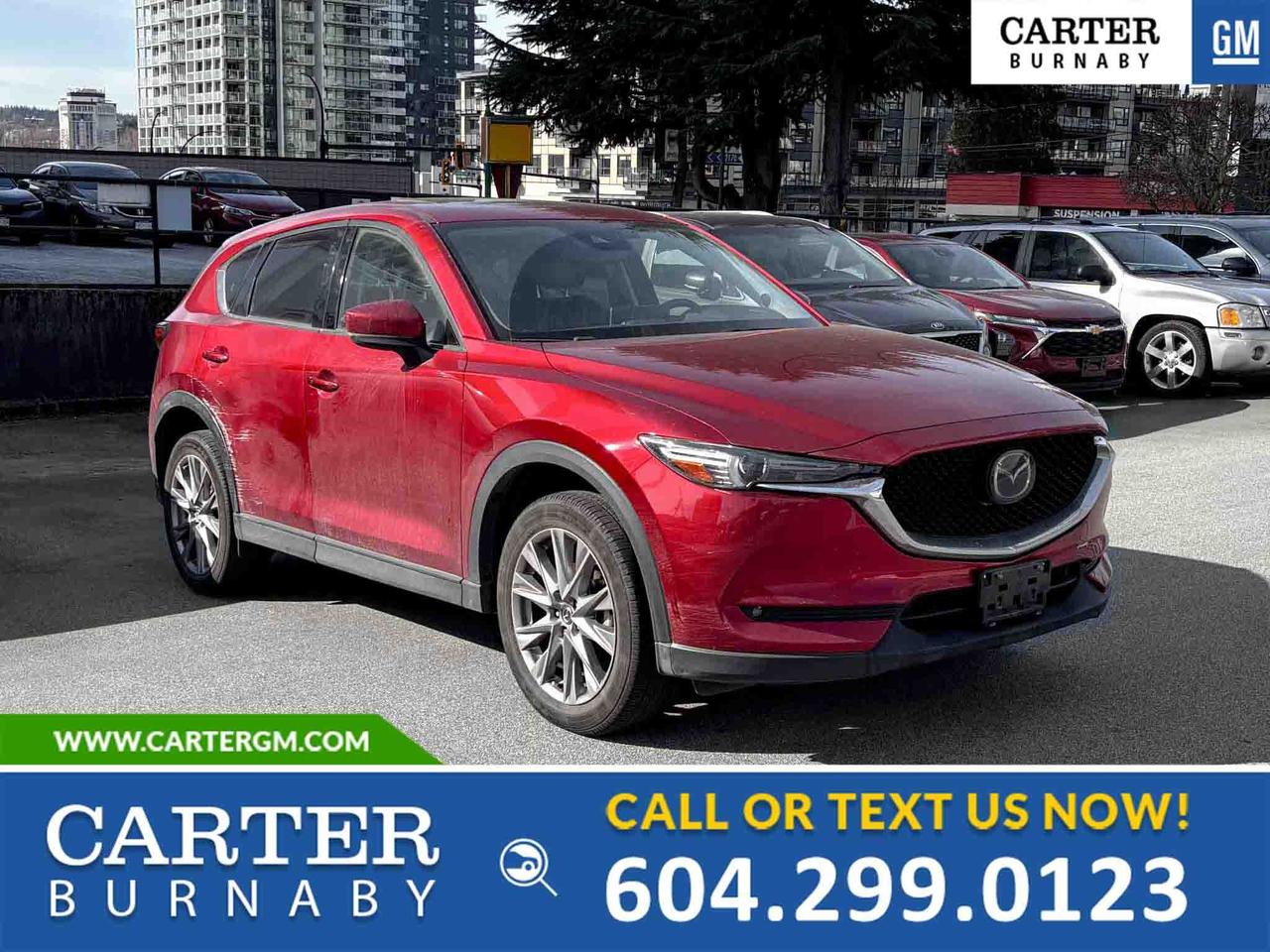 NO ACCIDENTS | ONE OWNER
Experience premium comfort and performance in this 2021 Mazda CX-5 GT AWD. Powered by a responsive 2.5L I-4 engine, it delivers a confident, refined drive. Enjoy upscale features like a sunroof, power and memory seats, heated seats, navigation, and automatic climate control. Stay connected with Bluetooth and confident with advanced safety including lane departure warning, adaptive cruise control, blind spot monitoring, traction control, and a rear vision camera. A power liftgate adds everyday convenience.

Come take it for a test drive today and experience all this stylish vehicle has to offer!

WHY CARTER GM BURNABY?

- An unrivalled vehicle purchasing experience!
- Exceeding our loyal customers expectations since 1963
- 4.5 Google star rating (with 2,300+ customer reviews)
- Cargurus Top-rated Dealer 2025 Award
- Cargurus Top Value Dealer 2025 Award
- Peace of mind - 150-point vehicle inspection
- CARFAX - full vehicle service history - purchase with confidence!
- Vehicle trades welcome! Best price guaranteed!
- We provide upfront pricing, zero hidden fees, and 100% transparency
- Fast approvals and 99% acceptance rates (no matter your current credit status!)
- Multilingual staff (many languages spoken)
- Comfortable non-pressured environment with in-store television, WIFI and a childrens play area!
- In-store restaurant: fresh daily menu





Were here to help you drive the vehicle you want, the vehicle you deserve!
QUESTIONS? GREAT! WEVE GOT ANSWERS!
To speak with a friendly vehicle specialist - CALL NOW!
The advertised price includes all standard dealer fees and any applicable manufacturer or dealer incentives. It does not include applicable taxes, licensing, insurance, or optional products or services. Dealer fees will be clearly broken out and itemized on the bill of sale, maximum total of fees $495.00. Prices are shown in Canadian dollars. While we make every effort to ensure accuracy, vehicle details, pricing, options, and availability are subject to change without notice. Please confirm all information with dealership sales management before purchase. Dealer Code: 81129