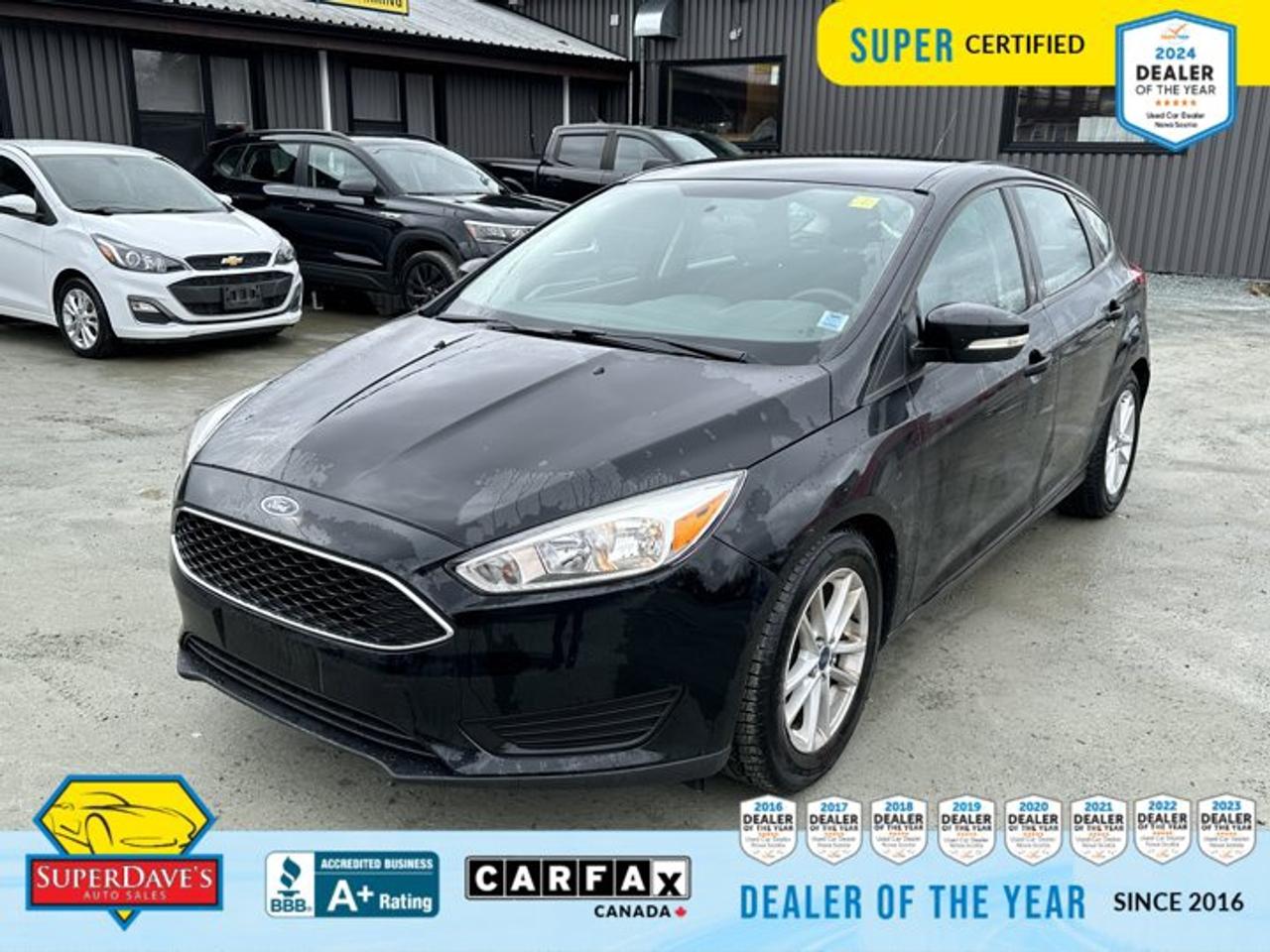 Looking for a dependable, well-equipped hatchback that still feels fresh? This 2018 Ford Focus SE in sleek black is Super Certified and ready to impress. With just 71,113 km on the clock, its a low mileage find that delivers the everyday practicality of a five-seat hatch with the nimble feel of a sporty compact. The 2.0L TI VCT GDI four-cylinder paired to a 6-speed Auto-Shift Manual offers responsive, confidence-inspiring driving for city runs or weekend escapes, while the hatchback layout gives you flexible cargo options and a pass-through rear seat for larger loads.<br><p>THE SUPER DAVES ADVANTAGE</p> <p>BUY REMOTE - No need to visit the dealership. Through email, text, or a phone call, you can complete the purchase of your next vehicle all without leaving your house!</p> <p>DELIVERED TO YOUR DOOR - Your new car, delivered straight to your door! When buying your car with Super Daves, well arrange a fast and secure delivery. Just pick a time that works for you and well bring you your new wheels!</p> <p>PEACE OF MIND WARRANTY - Every vehicle we sell comes backed with a warranty so you can drive with confidence.</p> <p>EXTENDED COVERAGE - Get added protection on your new car and drive confidently with our selection of competitively priced extended warranties.</p> <p>WE ACCEPT TRADES - We&rsquo;ll accept your trade for top dollar! We&rsquo;ll assess your trade in with a few quick questions and offer a guaranteed value for your ride. We&rsquo;ll even come pick up your trade when we deliver your new car.</p> <p>SUPER CERTIFIED INSPECTION - Every vehicle undergoes an extensive 120 point inspection, that ensure you get a safe, high quality used vehicle every time.</p> <p>FREE CARFAX VEHICLE HISTORY REPORT - If youre buying used, its important to know your cars history. Thats why we provide a free vehicle history report that lists any accidents, prior defects, and other important information that may be useful to you in your decision.</p> <p>METICULOUSLY DETAILED &ndash; Buying used doesn&rsquo;t mean buying grubby. We want your car to shine and sparkle when it arrives to you. Our professional team of detailers will have your new-to-you ride looking new car fresh.</p> <p>(Please note that we make all attempt to verify equipment, trim levels, options, accessories, kilometers and price listed in our ads however we make no guarantees regarding the accuracy of these ads online. Features are populated by VIN decoder from manufacturers original specifications. Some equipment such as wheels and wheels sizes, along with other equipment or features may have changed or may not be present. We do not guarantee a vehicle manual, manuals can be typically found online in the rare event the vehicle does not have one. Please verify all listed information with our dealership in person before purchase. The sale price does not include any ongoing subscription based services such as Satellite Radio. Any software or hardware updates needed to run any of these systems would also be the responsibility of the client. All listed payments are OAC which means On Approved Credit and are estimated without taxes and fees as these may vary from deal to deal, taxes and fees are extra. As these payments are based off our lenders best offering they may be subject to change without notice. Please ensure this vehicle is ready to be viewed at the dealership by making an appointment with our sales staff. We cannot guarantee this vehicle will be on premises and ready for viewing unless and appointment has been made.)</p>