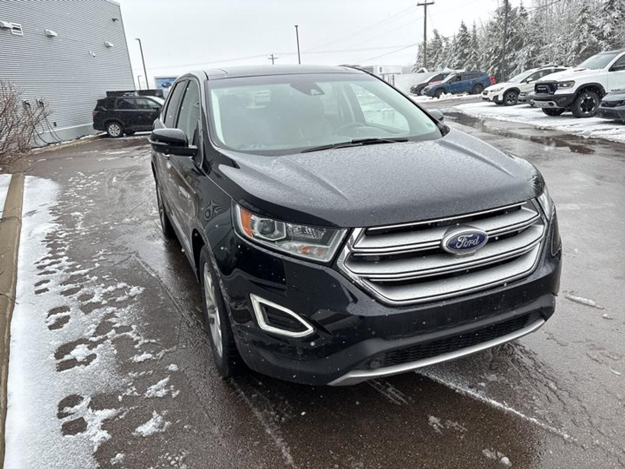 Small SUV 4WD, 4dr Titanium AWD, 6-Speed Automatic w/OD, Regular Unleaded V-6 3.5 L/213