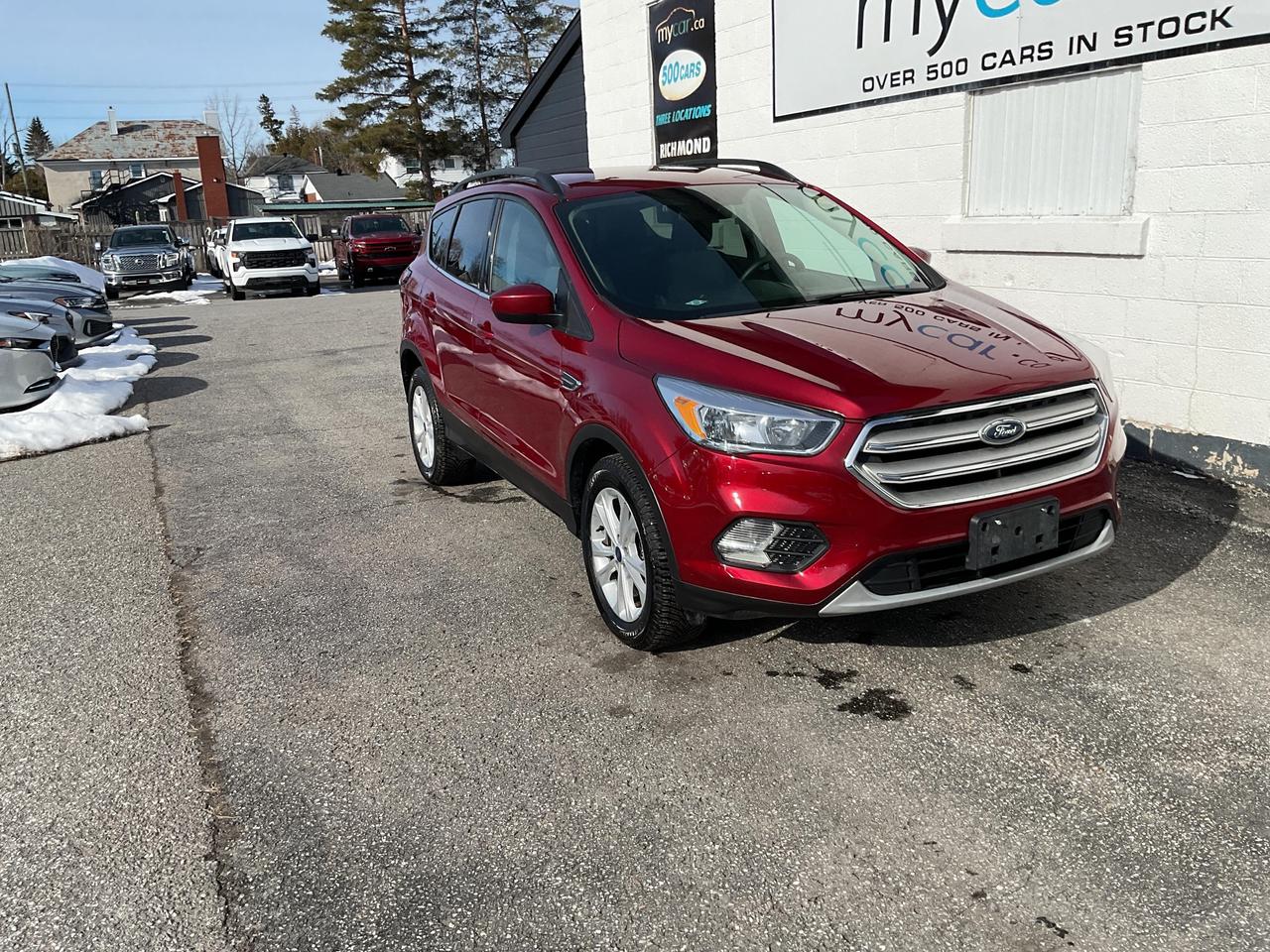 ???? 1.5L SE  FORD ESCAPE SE 2018  Your adventure-ready SUV! ????<br><br>

This reliable 2018 Ford Escape SE with only 89,251 KMs is packed with comfort and convenience features. Four Wheel Drive capability means youre ready for any road condition, while the fuel-efficient 1.5L engine keeps you going further for less!<br><br>

Features youll love:<br>
? Four Wheel Drive<br>
? Heated Seats<br>
? Backup Camera<br>
? Bluetooth Connectivity<br>
? Air Conditioning<br>
? Cruise Control<br>
? Full Power Group<br><br>

?? NO FEES! <span>(Just pay applicable taxes.)</span><br>
?? LOWEST PRICE GUARANTEED!<br><br>

?? 4 LOCATIONS TO SERVE YOU BETTER:<br>
?? RICHMOND: 1-888-416-2199<br>
?? OTTAWA: (343) 429-6444<br>
?? KINGSTON: 1-888-508-3494<br>
?? NORTH BAY: 1-888-282-3560<br><br>

?? Visit <strong>WWW.MYCAR.CA</strong> to see this FORD ESCAPE and more!<br>
?? Confidence, comfort, and value  all in one! ??