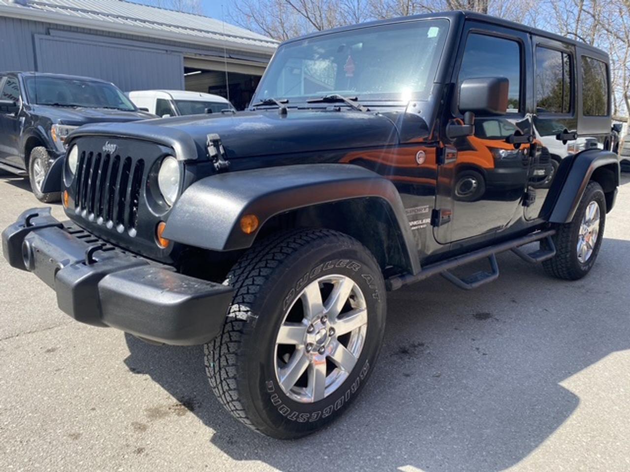 2011 Jeep Wrangler UNLIMITED SPORT Photo