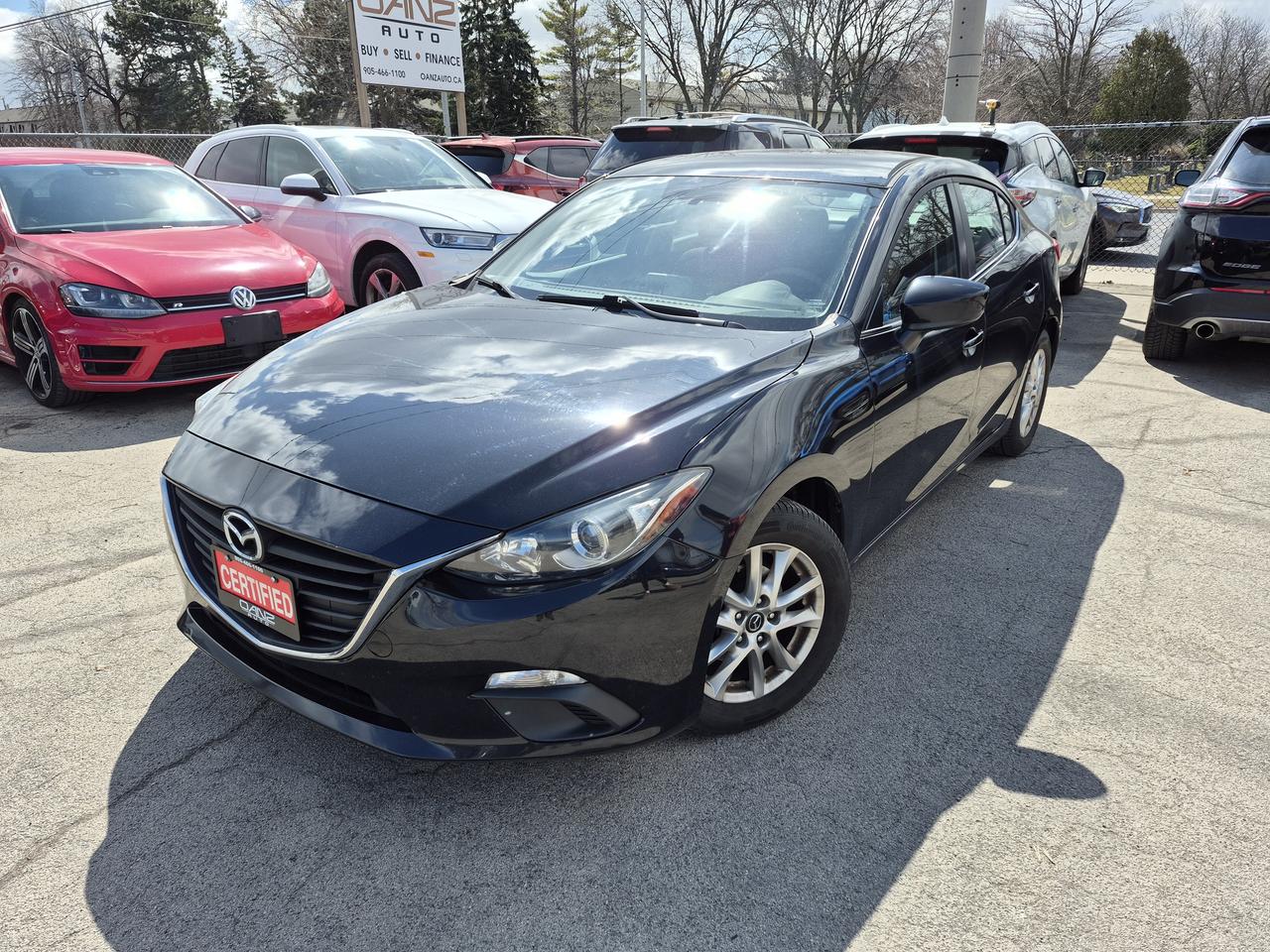 2016 Mazda MAZDA3 i Touring Photo