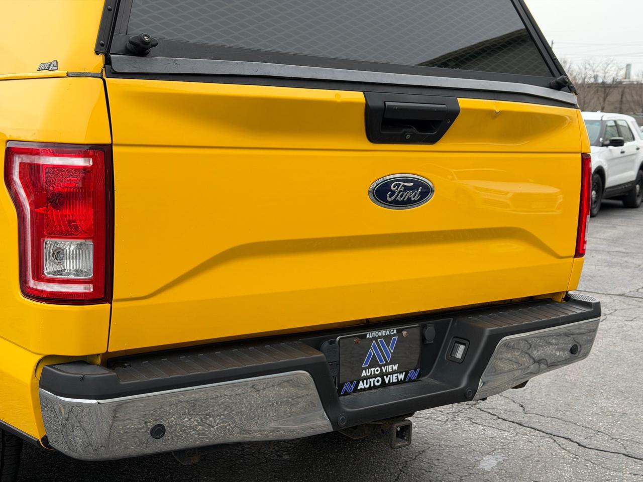 2017 Ford F-150 XLT **FULL CAP W/ SLIDE OUT BED** Photo