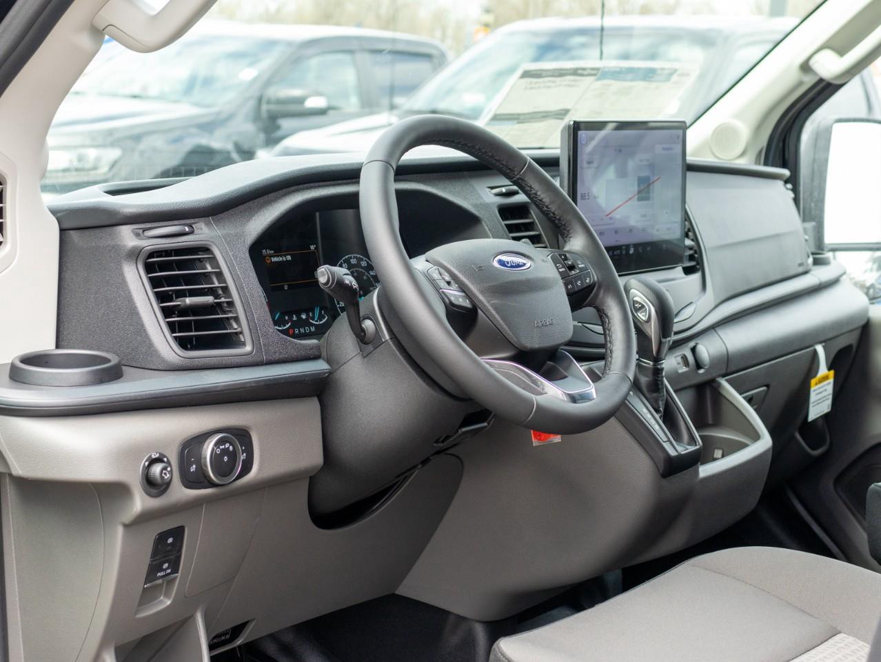 2025 Ford Transit-150 Cargo Base All-Wheel Drive Medium Roof Van 148 in. WB Photo