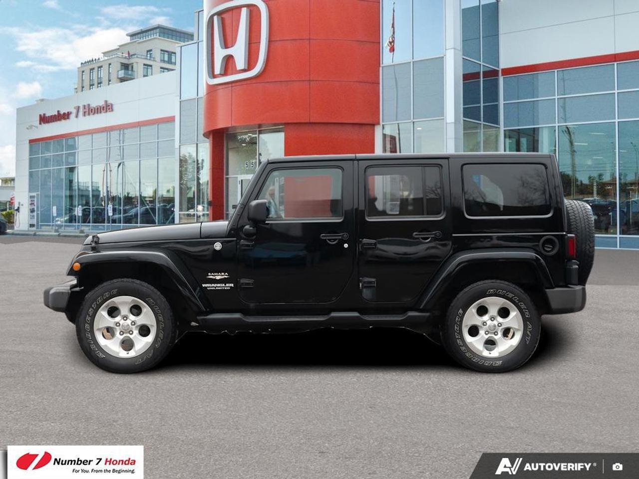2013 Jeep Wrangler 4dr 4wd Sahara Photo