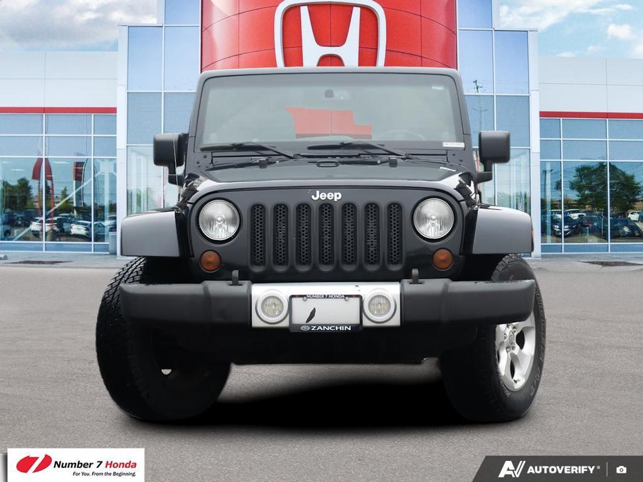 2013 Jeep Wrangler 4dr 4wd Sahara Photo