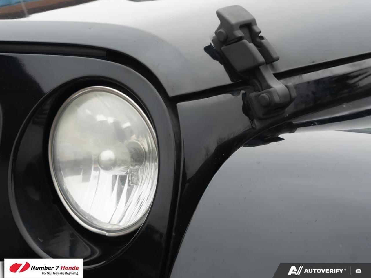 2013 Jeep Wrangler 4dr 4wd Sahara Photo