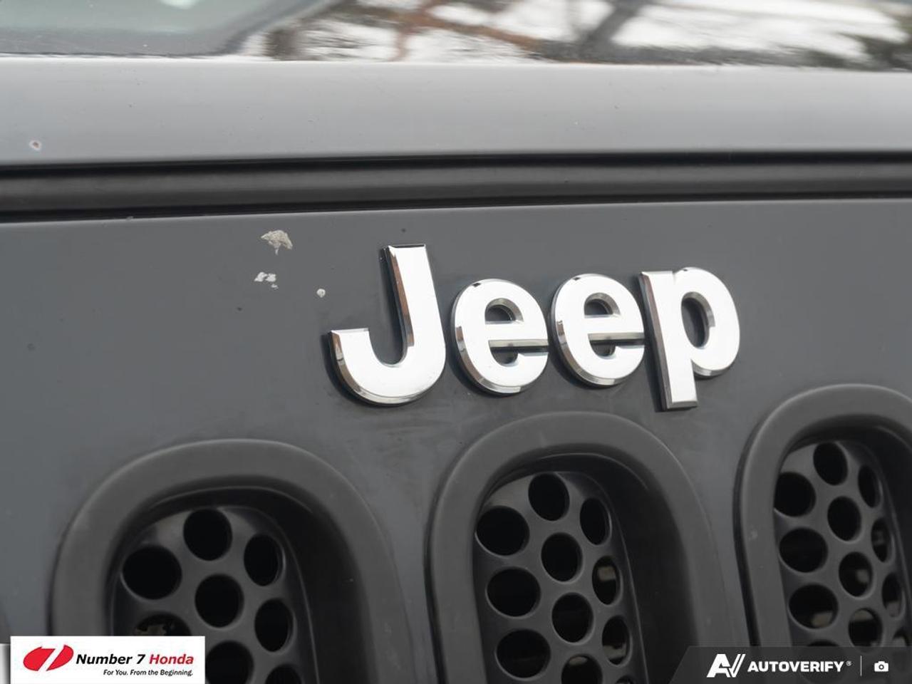 2013 Jeep Wrangler 4dr 4wd Sahara Photo