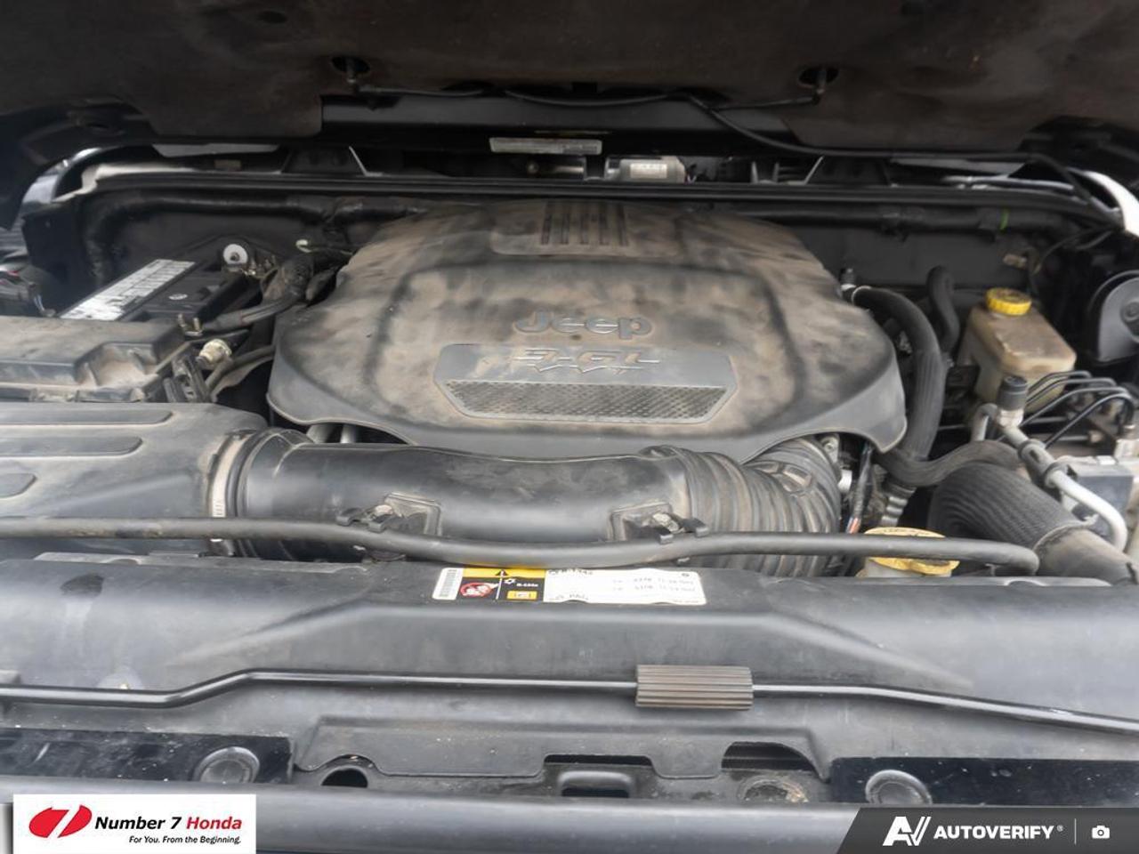 2013 Jeep Wrangler 4dr 4wd Sahara Photo