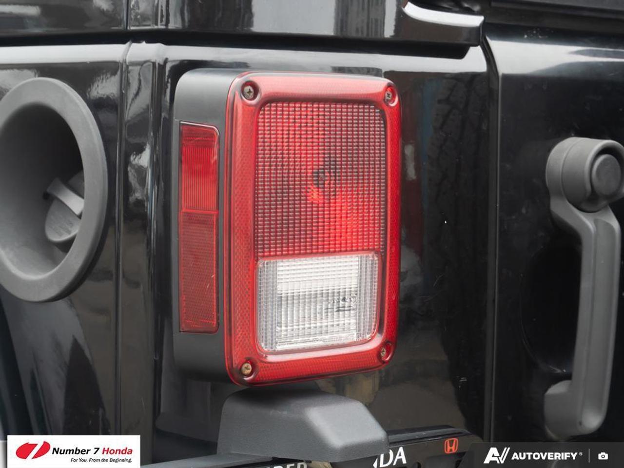 2013 Jeep Wrangler 4dr 4wd Sahara Photo