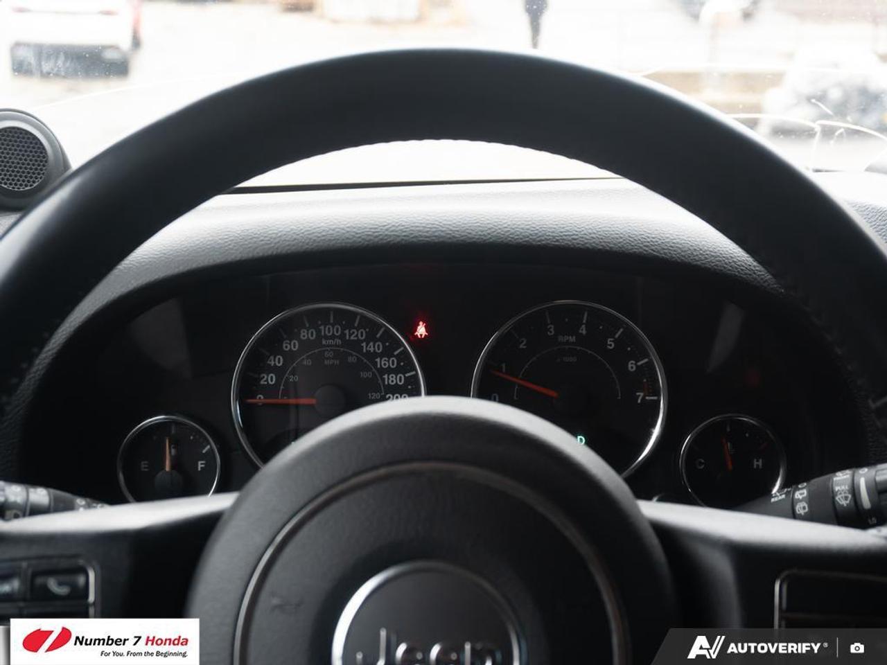 2013 Jeep Wrangler 4dr 4wd Sahara Photo