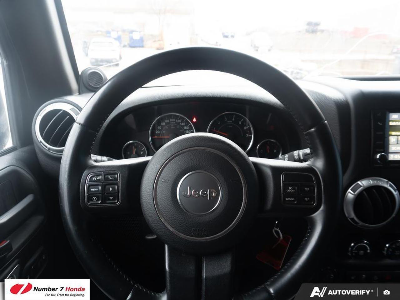 2013 Jeep Wrangler 4dr 4wd Sahara Photo