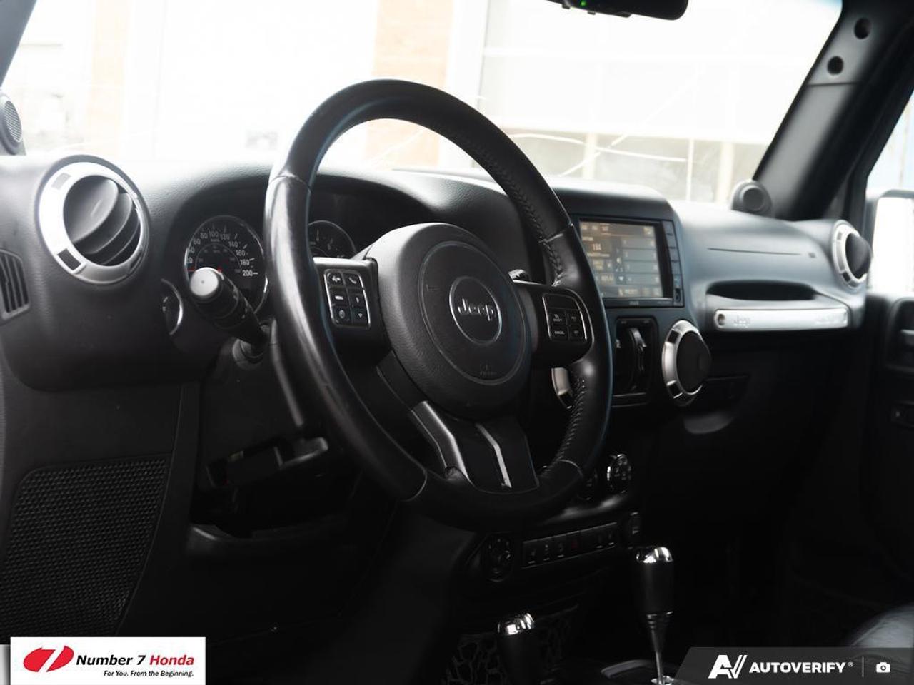 2013 Jeep Wrangler 4dr 4wd Sahara Photo