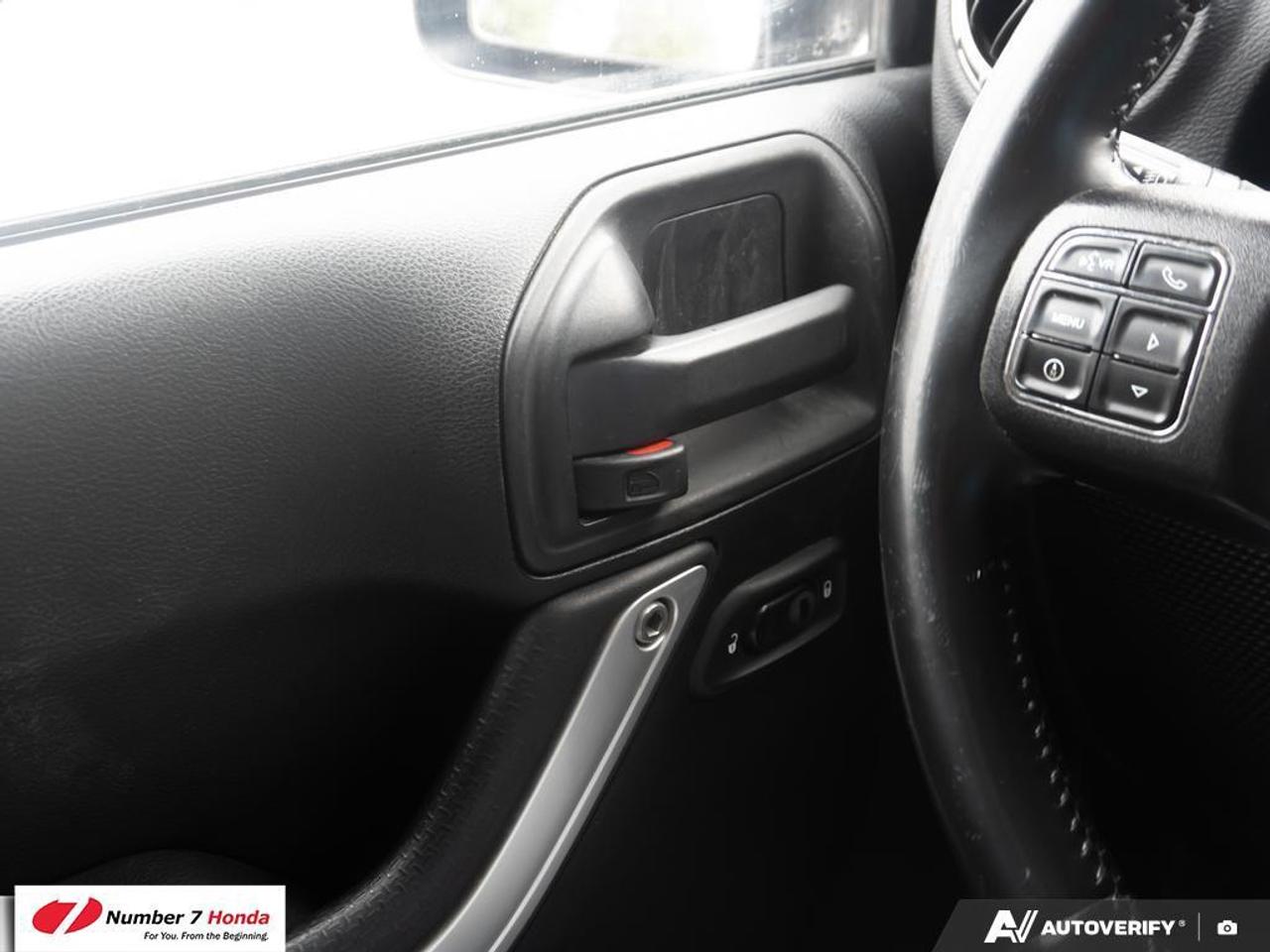 2013 Jeep Wrangler 4dr 4wd Sahara Photo