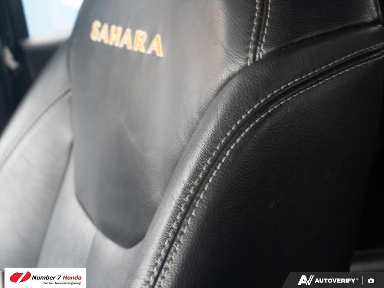 2013 Jeep Wrangler 4dr 4wd Sahara Photo