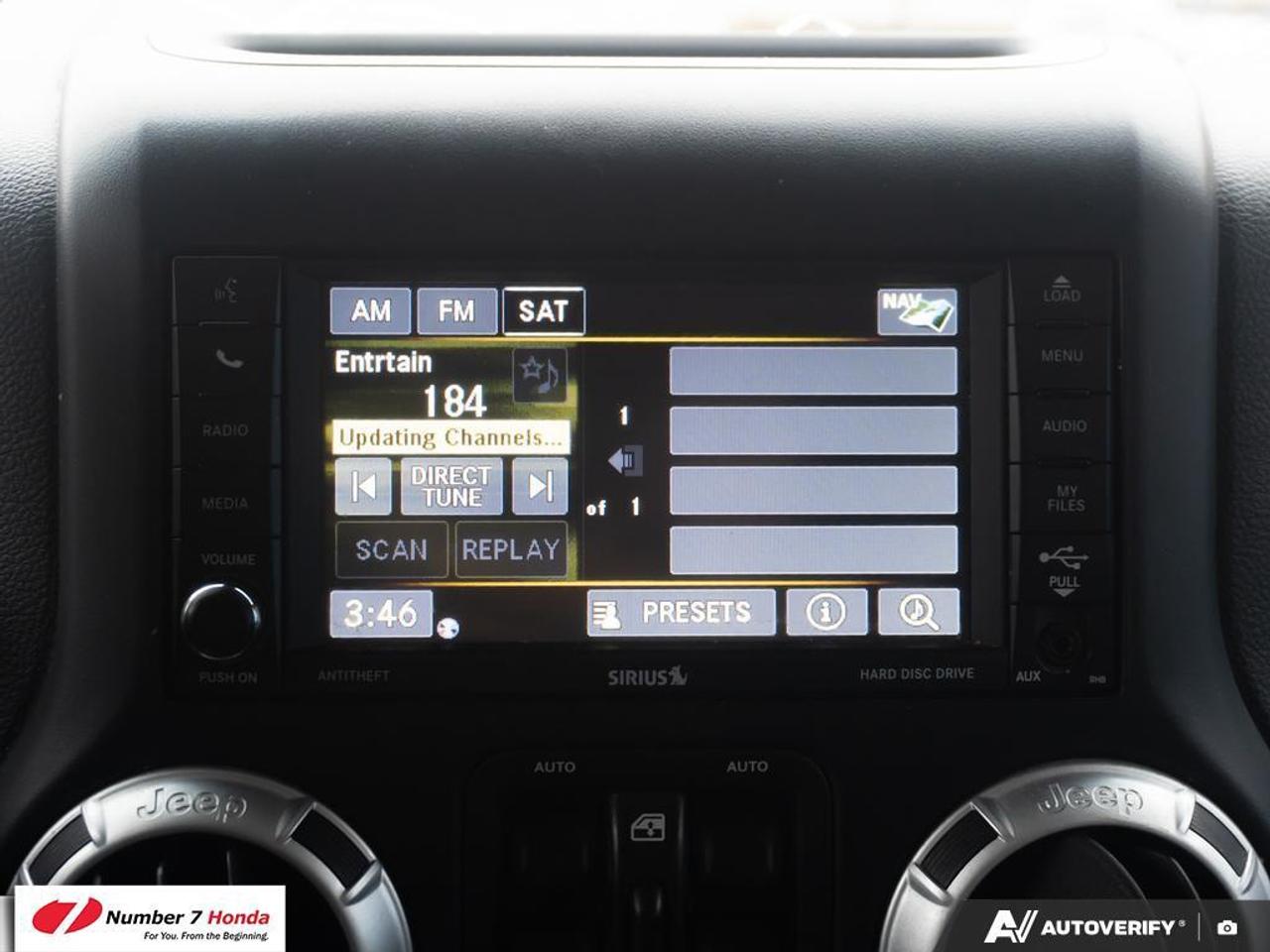 2013 Jeep Wrangler 4dr 4wd Sahara Photo
