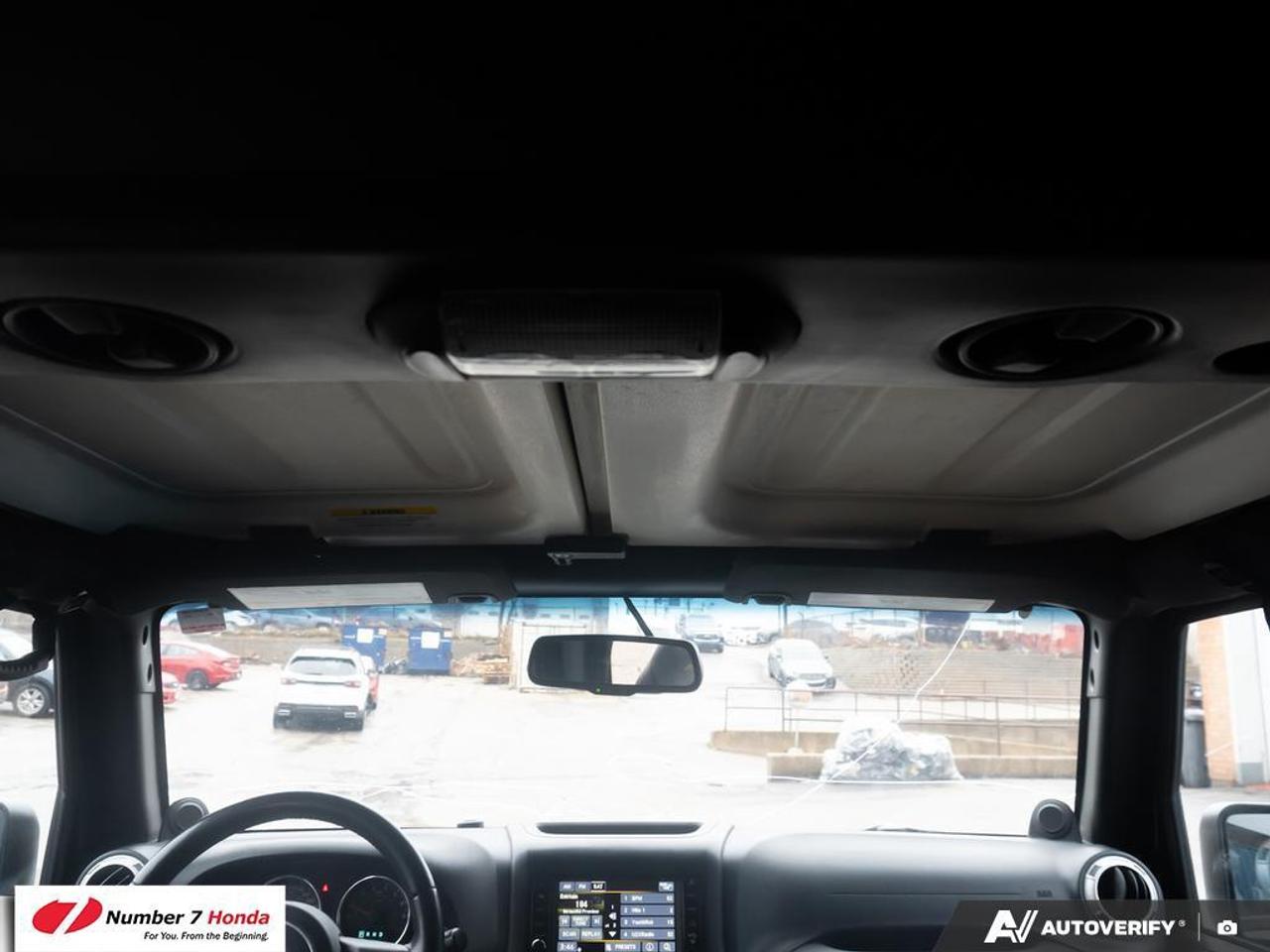 2013 Jeep Wrangler 4dr 4wd Sahara Photo