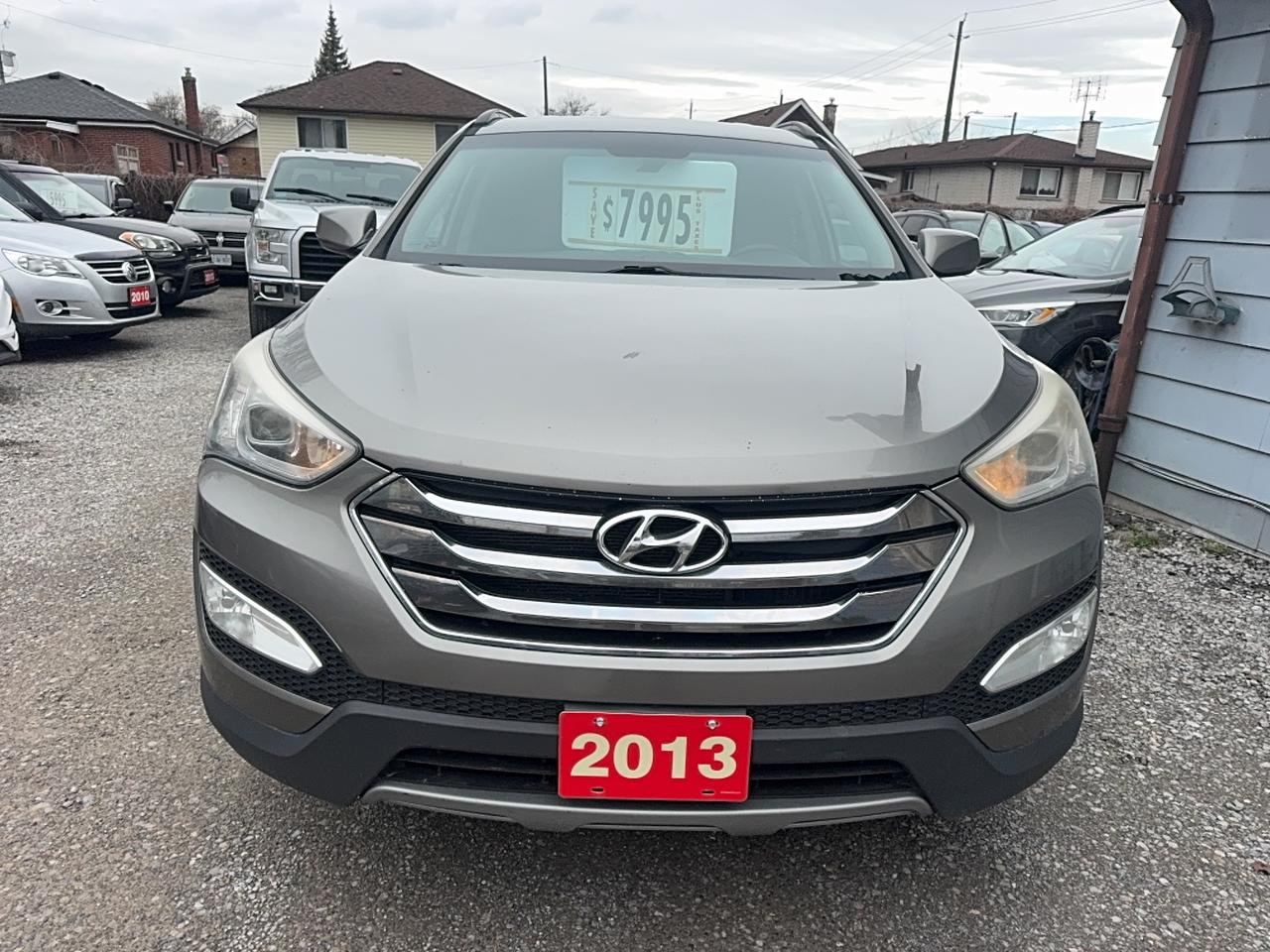 <div>2013 Hyundai Santa Fe Sport Gray with black interior has clean carfax no accidents reported fully certified Assurant coast to coast 6 months 6000km $2500 per claim warranty included looks and runs great&nbsp;</div>