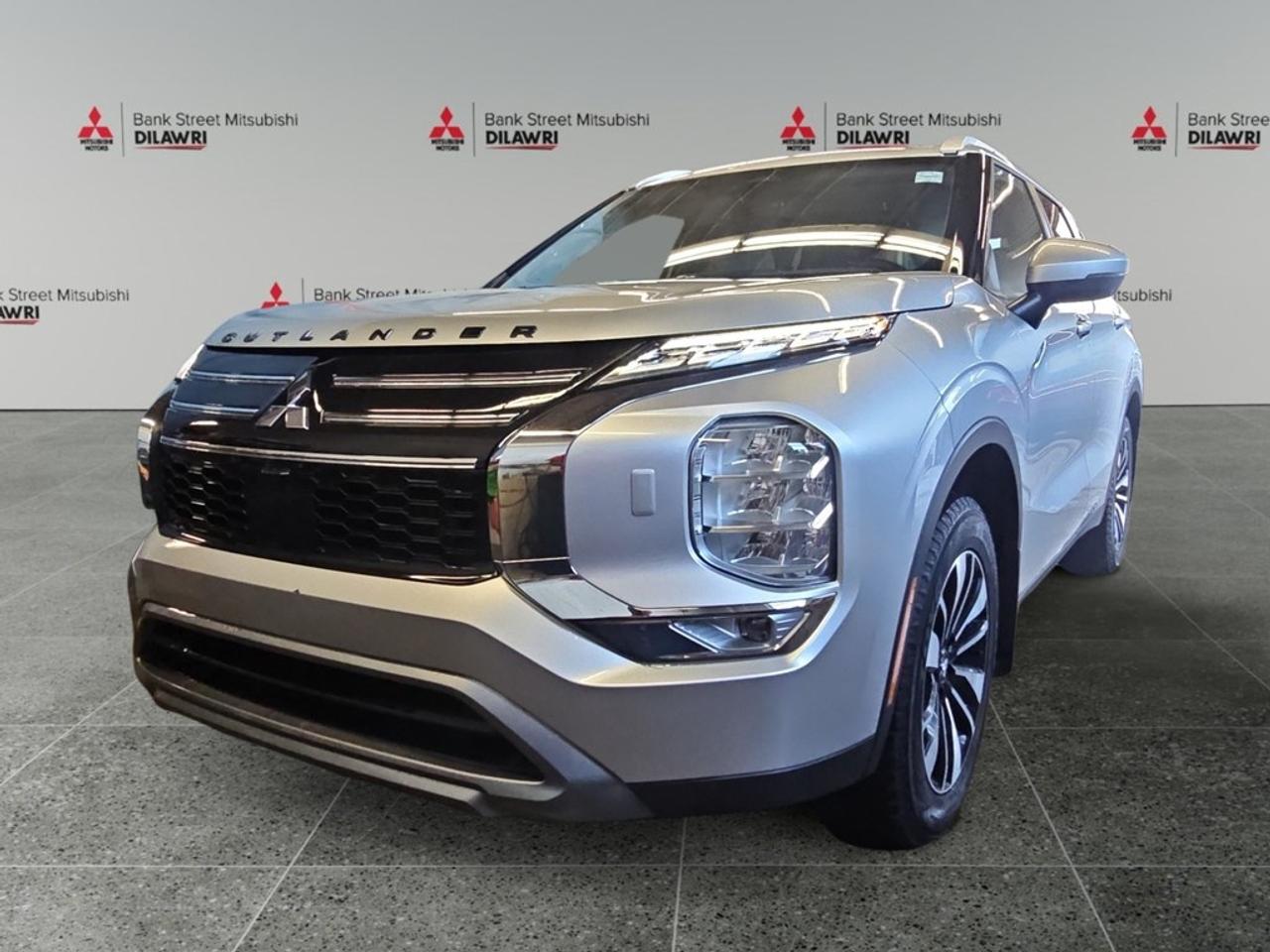 Balance of 5 year/100,000kms BASIC warranty and 10 year/160,000kms Factory Powertrain Warranty on ALL MITSUBISHI products! Best in the industry!!!! Introducing the 2025 Mitsubishi Outlander LE S-AWC in a stylish gray finish, equipped with an advanced AWD system that ensures a confident and stable drive across various terrains. This dynamic SUV boasts a contemporary design with elegant alloy wheels and a sleek silhouette that exudes sophistication. Step inside to a refined interior where comfort meets convenience, featuring heated seats and a sunroof/moonroof that invites natural light into the spacious cabin. Stay connected on the go with smart device integration and enjoy your favorite music through satellite radio. The Outlander LE S-AWC takes safety and convenience seriously with features such as a backup camera, lane assist, parking sensors, and brake assist, providing peace of mind on every journey. Perfect for families and adventure seekers alike, this vehicle combines functionality and modern technology. Contact us today to schedule a test drive and explore all that the Mitsubishi Outlander LE S-AWC has to offer.